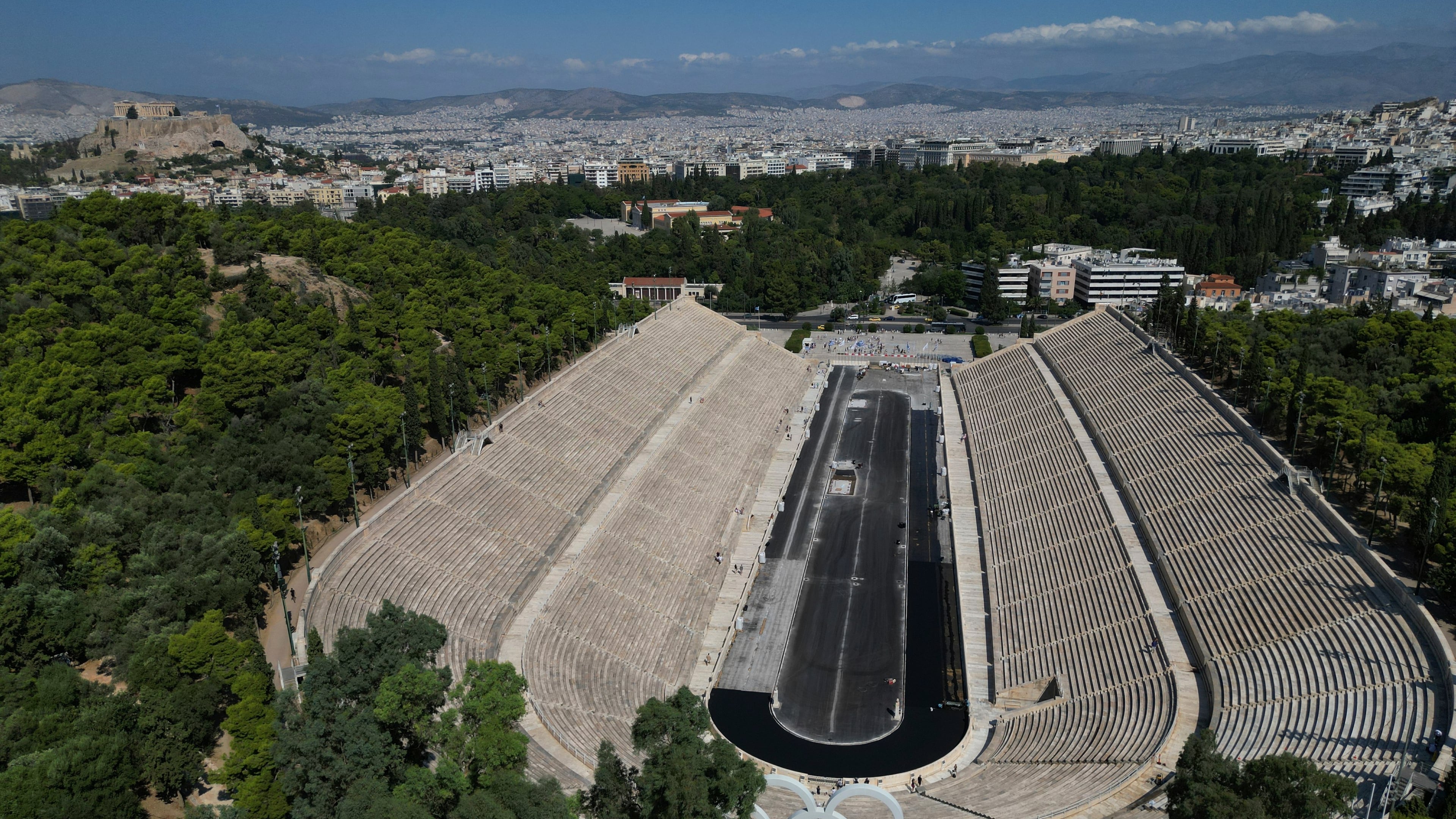 An aerial view of the Panathenaic Stadium, also known as "Kallimarmaro, or beautiful marble," which hosted the first modern Olympic Games in 1896, is seen during renovation work in Athens, Greece, Thursday, Aug. 13, 2026. (AP Photo/Thanassis Stavrakis)