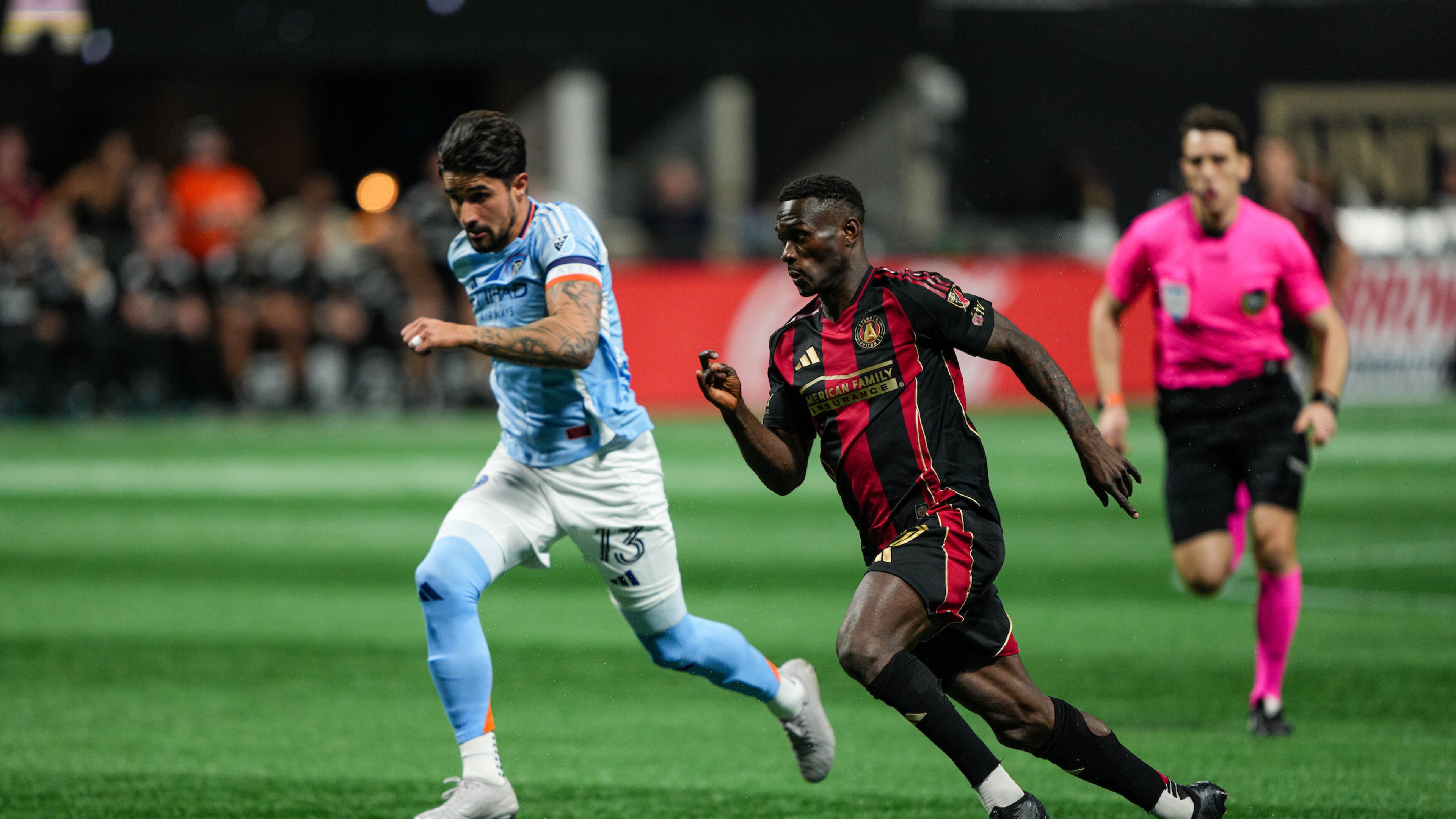 Atlanta United forward Emmanuel Latte Lath #19 dribbles during the match against the New York City FC at Mercedes-Benz Stadium in Atlanta on Saturday March 29, 2025. (Photo by Matthew Grimes/Atlanta United)