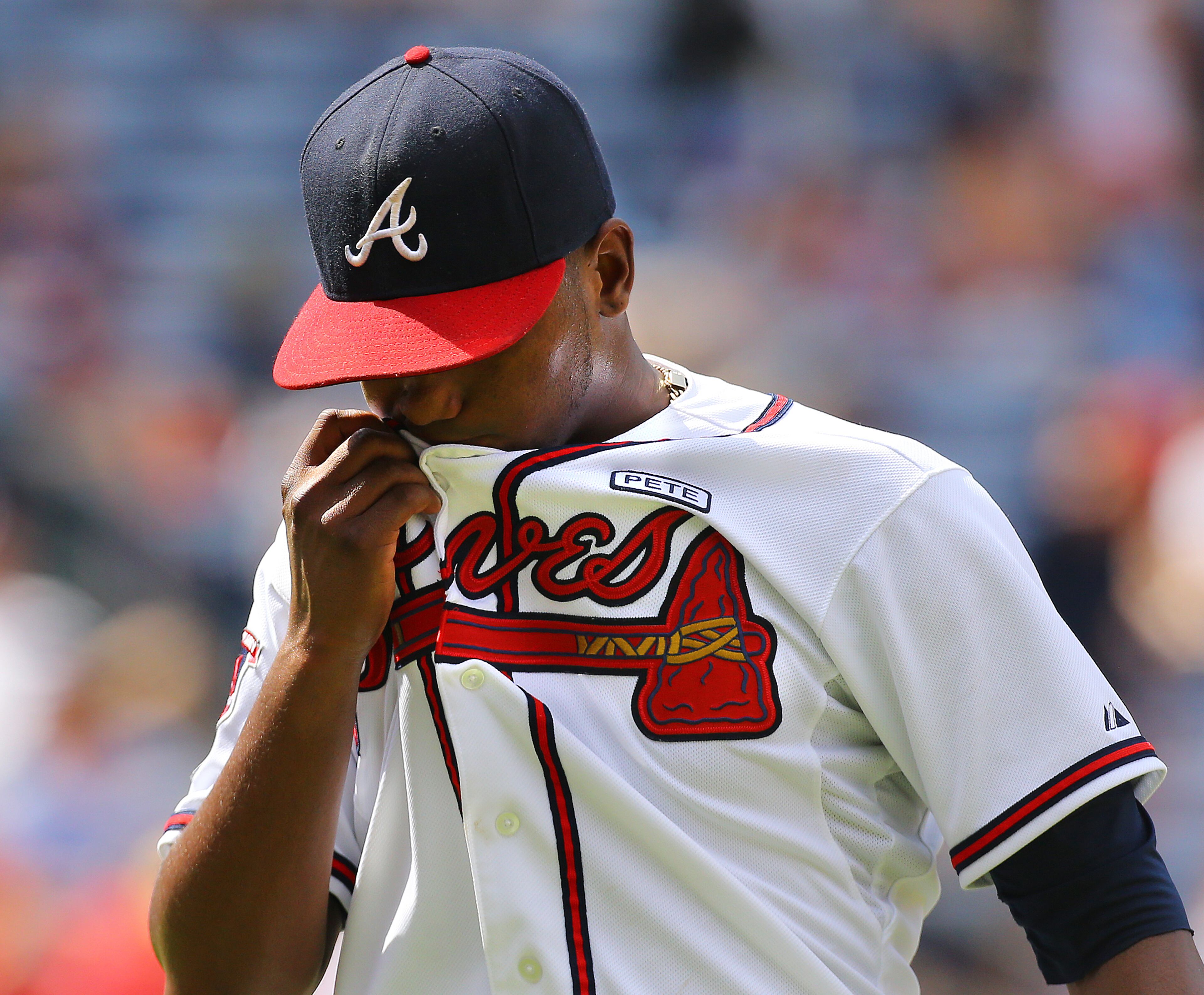 Braves pitcher Julio Teheran reacts to giving up a 3-RBI triple to Phillies Ben Revere during the sixth inning in a baseball game in Atlanta on Monday, Sept. 1, 2014. CURTIS COMPTON / CCOMPTON@AJC.COM
