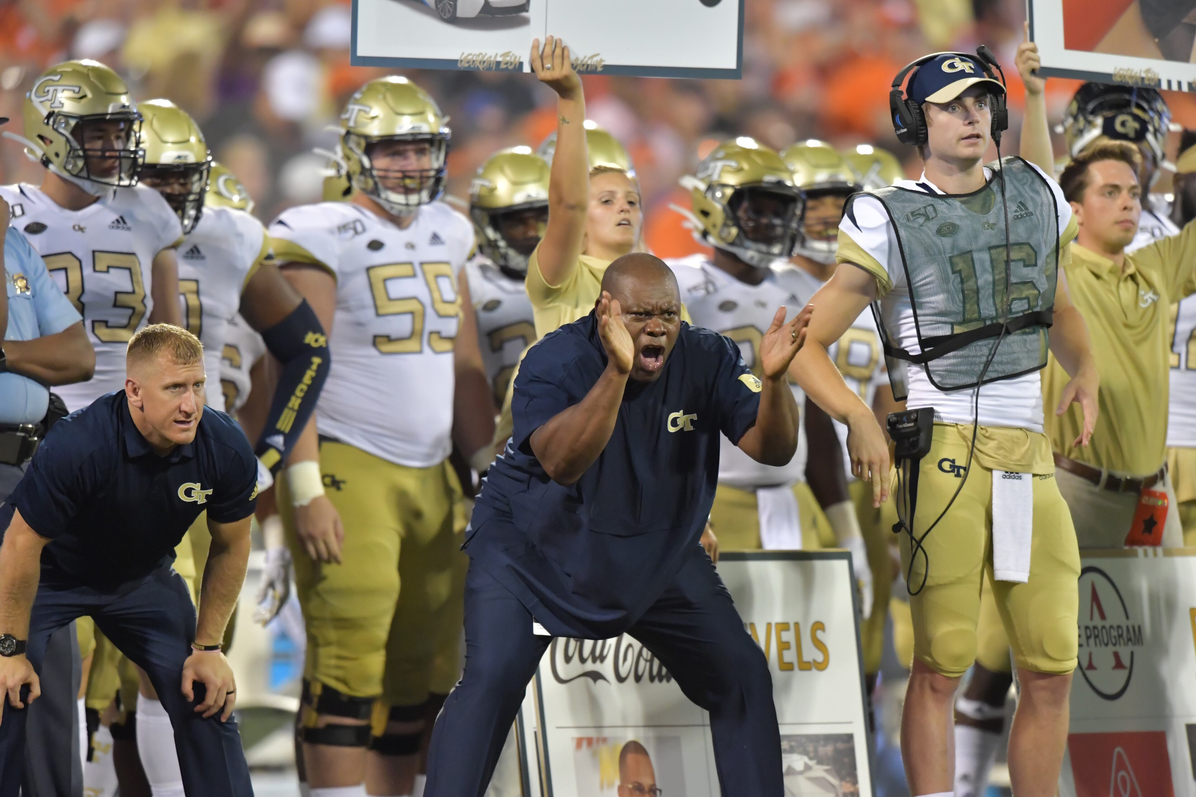 Georgia Tech coach staff reacts in the first half at Memorial Stadium on the Clemson University campus in Clemson, S.C. on Thursday, August 29, 2019. Georgia Tech took the field for the first time with Geoff Collins as head coach. (Hyosub Shin / Hyosub.Shin@ajc.com)