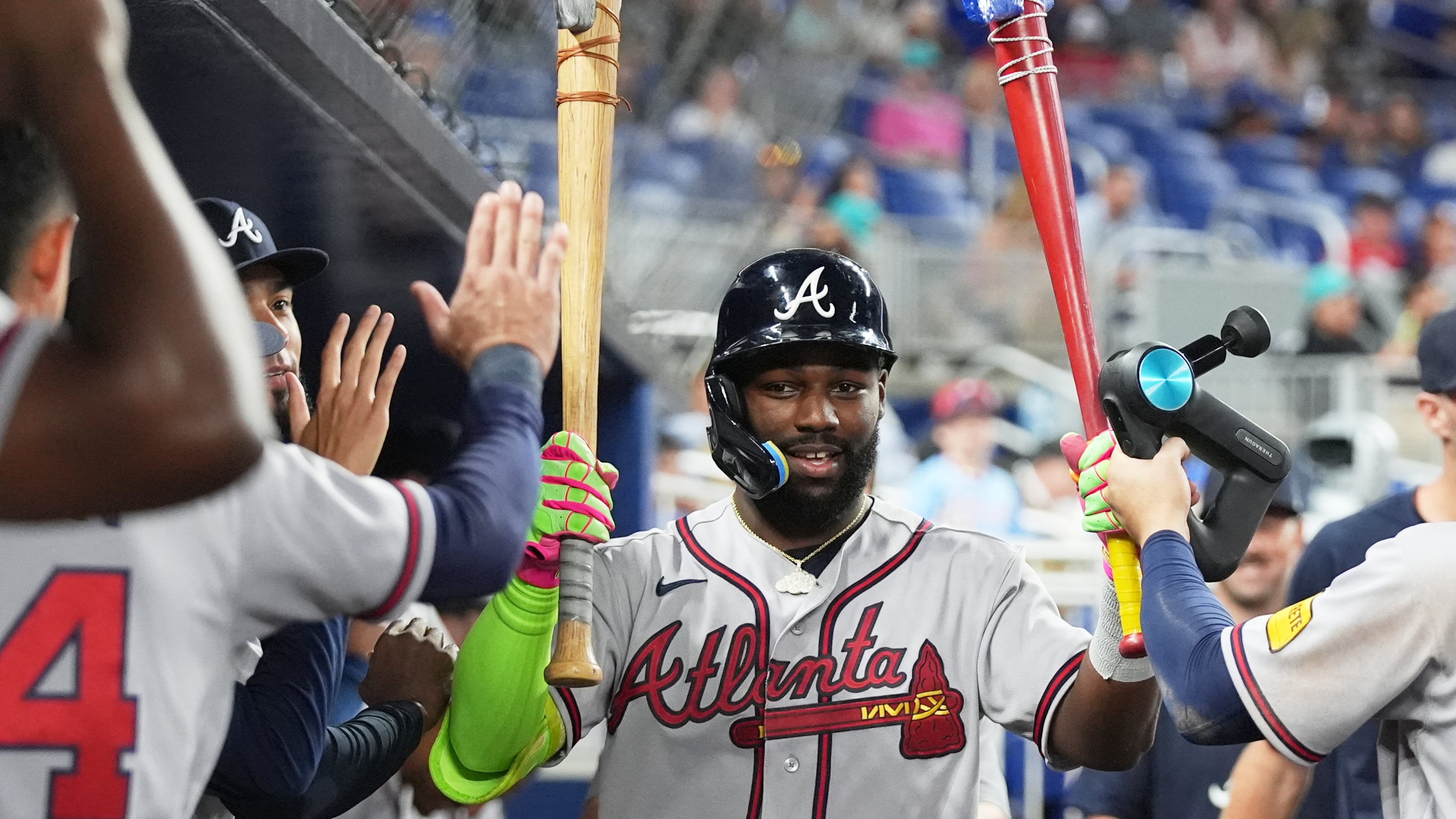 The Braves' Michael Harris II is congratulated after hitting a solo home run during the ninth inning against the Marlins on Thursday, May 21, 2026, in Miami. (Lynne Sladky/AP)