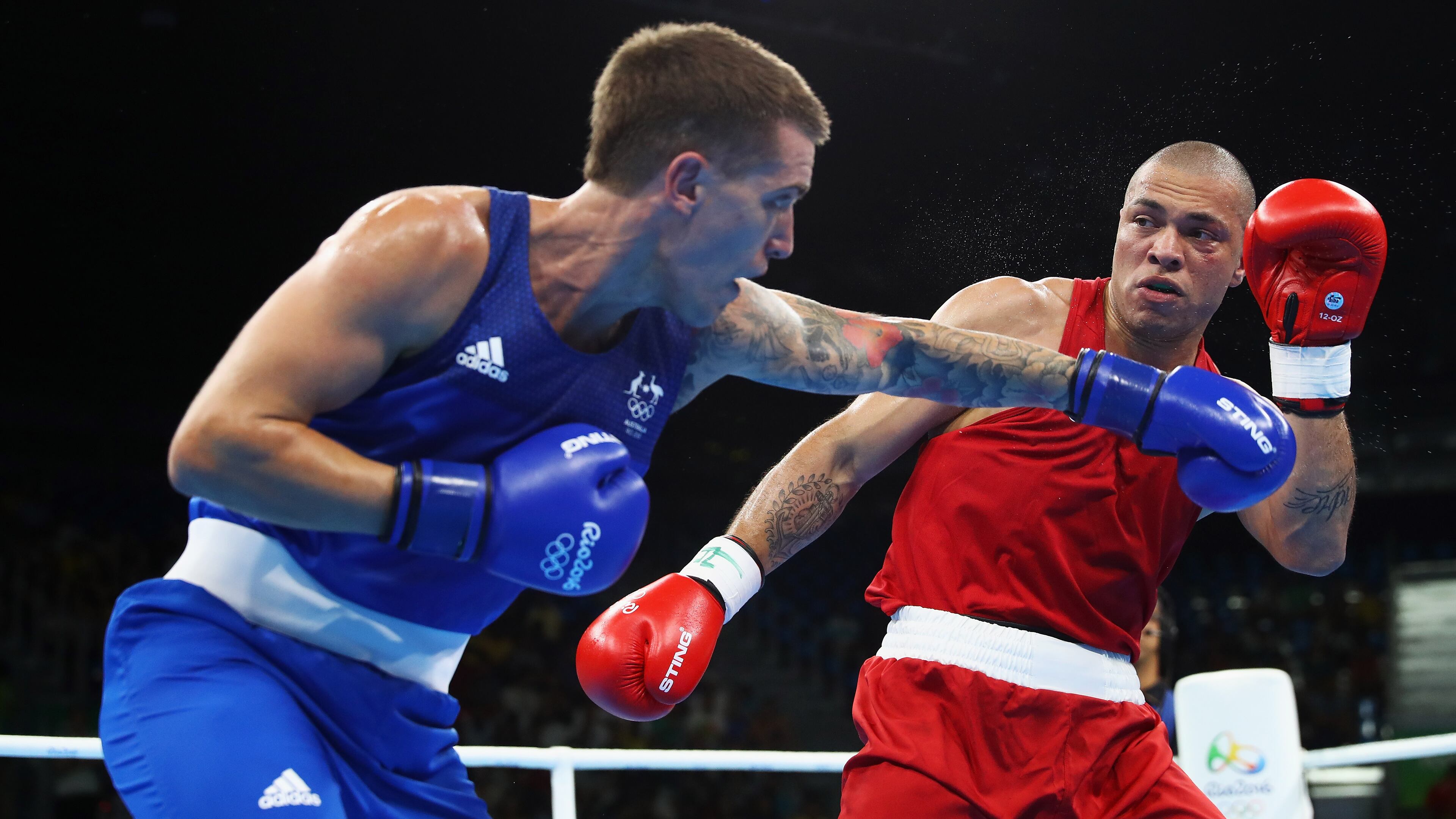 RIO DE JANEIRO, BRAZIL - AUGUST 06: Juan Goncalves Nogueira of Brazil and Jason Whateley of Australia compete in their Men's heavy 91 kg Preliminaries bout on Day 1 of the Rio 2016 Olympic Games at Riocentro - Pavilion 6 on August 6, 2016 in Rio de Janeiro, Brazil. (Photo by Dean Mouhtaropoulos/Getty Images)