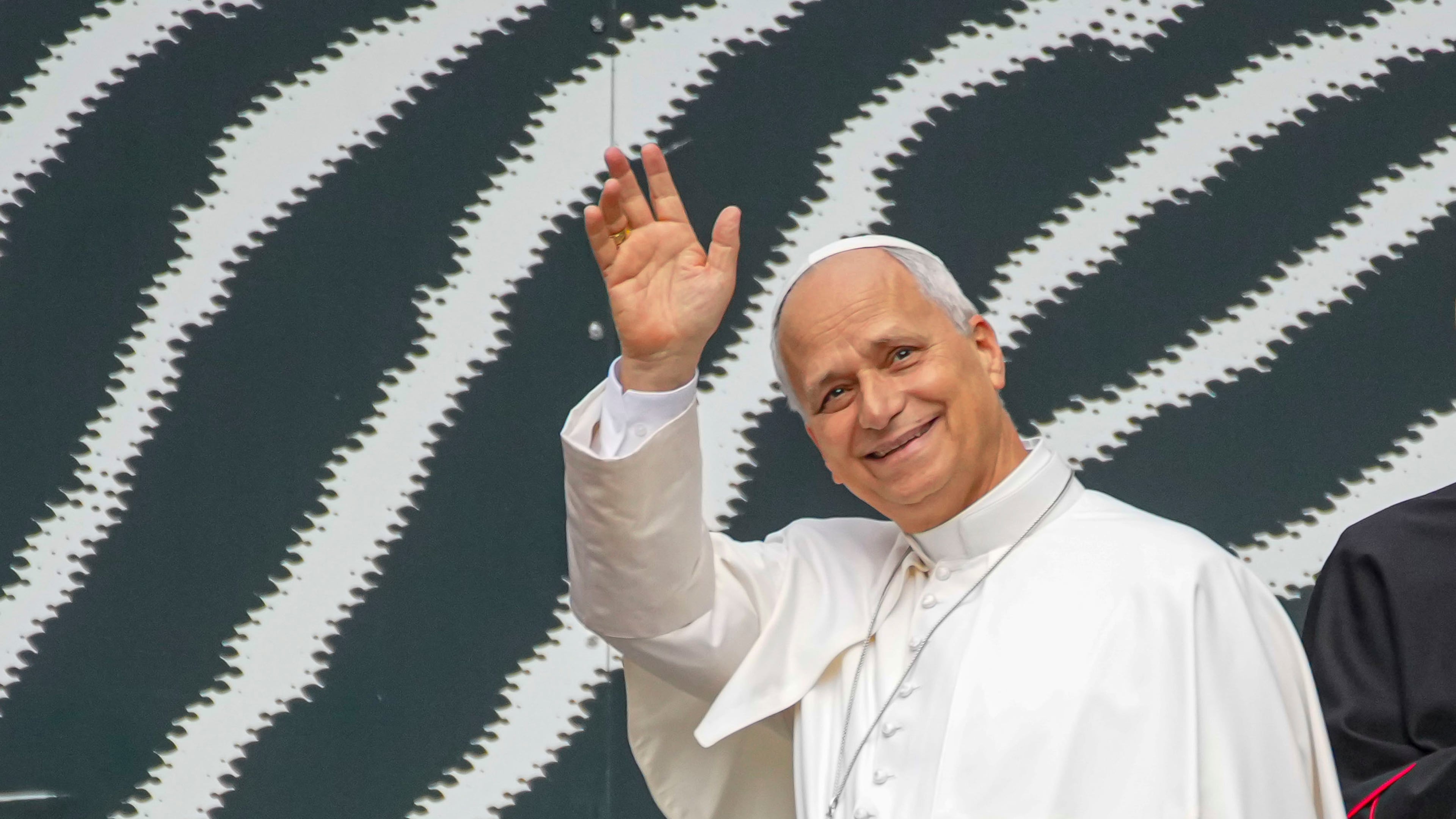 Pope Leo XIV waves as he arrives at the Vatican Library on the day of his 71st birthday, Monday, Sept. 14, 2026, during a press preview of the exhibit ""AQVA, Catastrophe and Wonder," which will be open to the public from Sept. 25 through May 14, 2027. (AP Photo/Andrew Medichini)