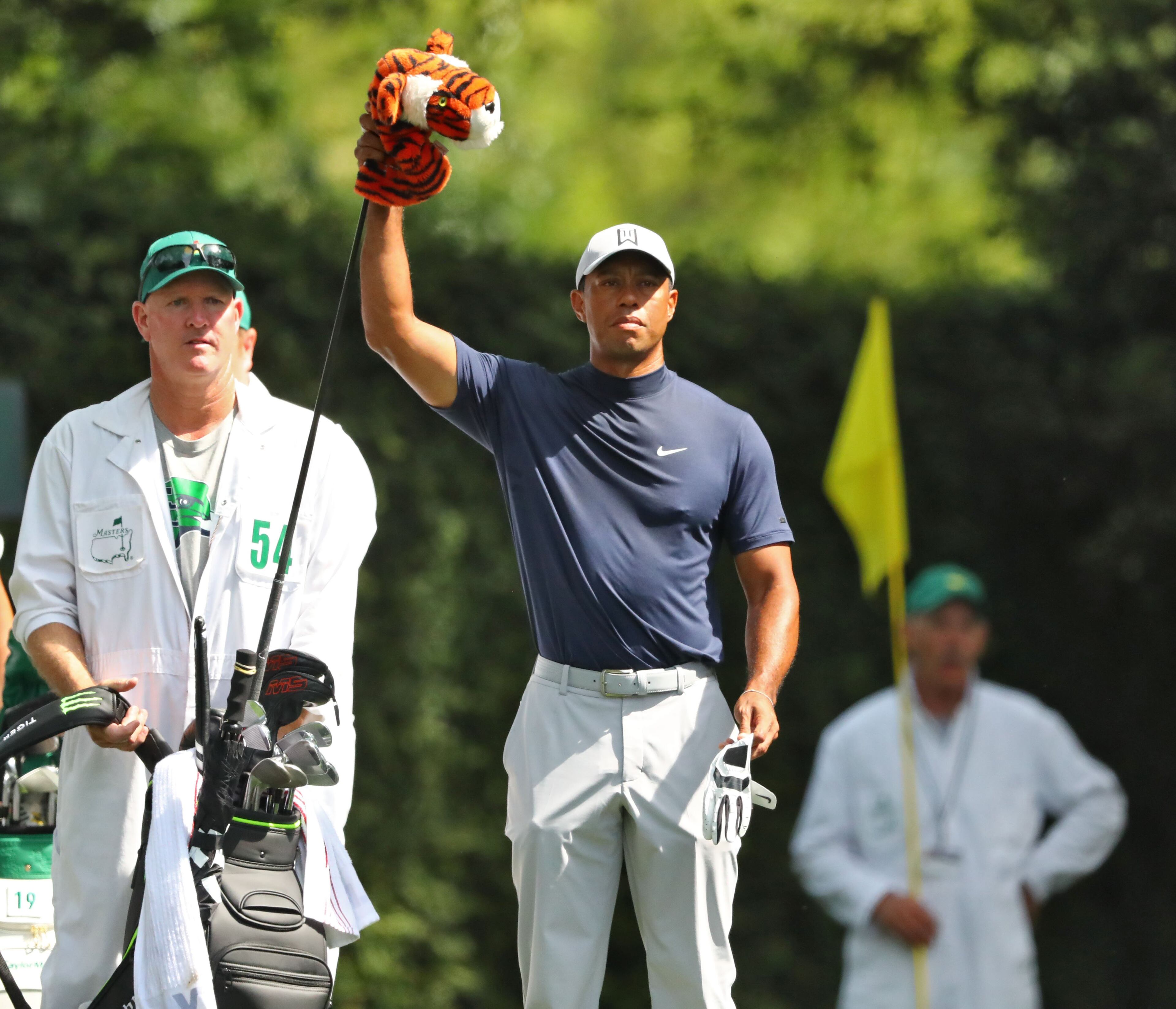 Tiger Woods gets ready to hit on the second tee during Thursday's first round. (Curtis Compton/ccompton@ajc.com)