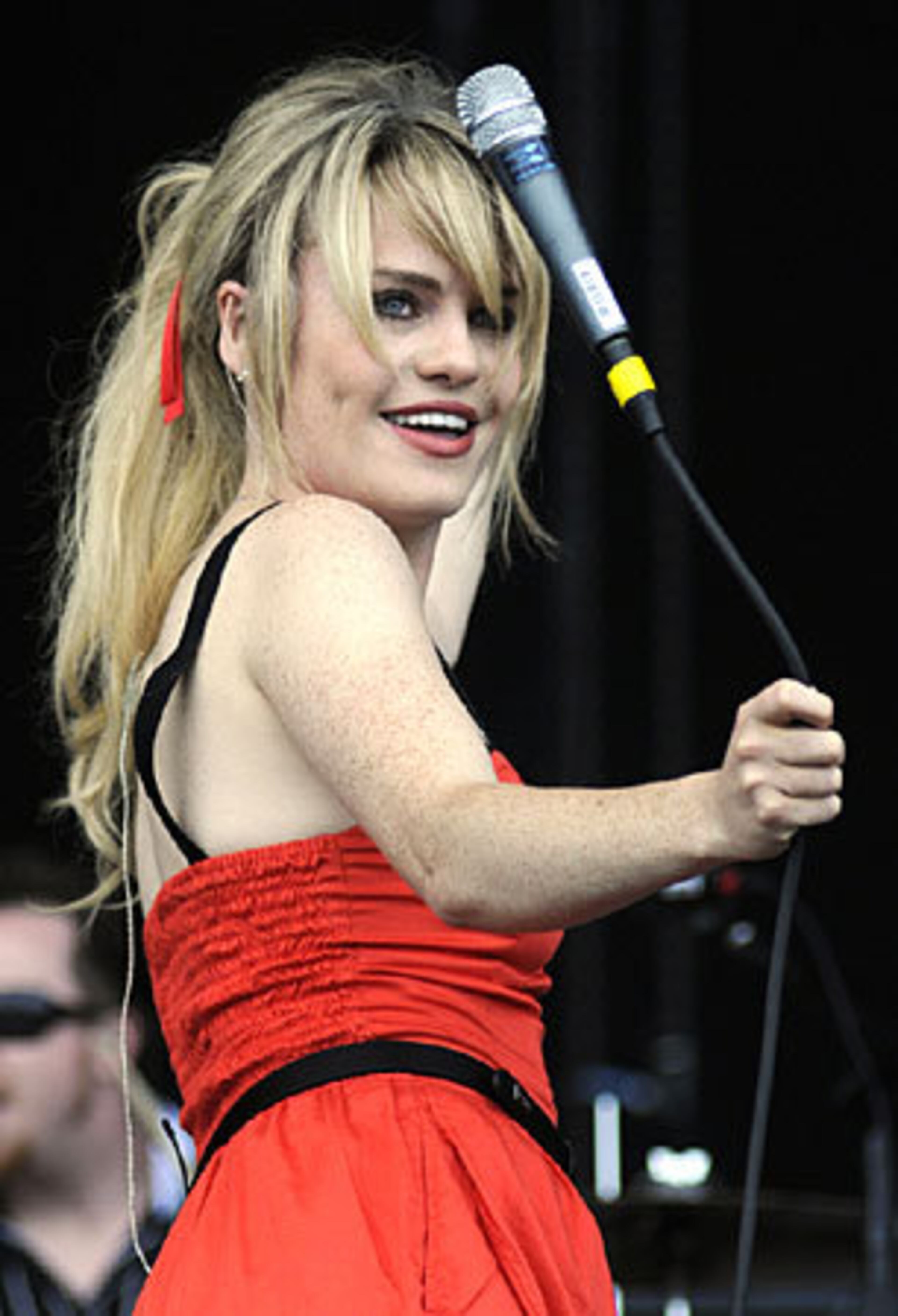 Duffy twirls her microphone while performing at the Virgin Mobile Festival.