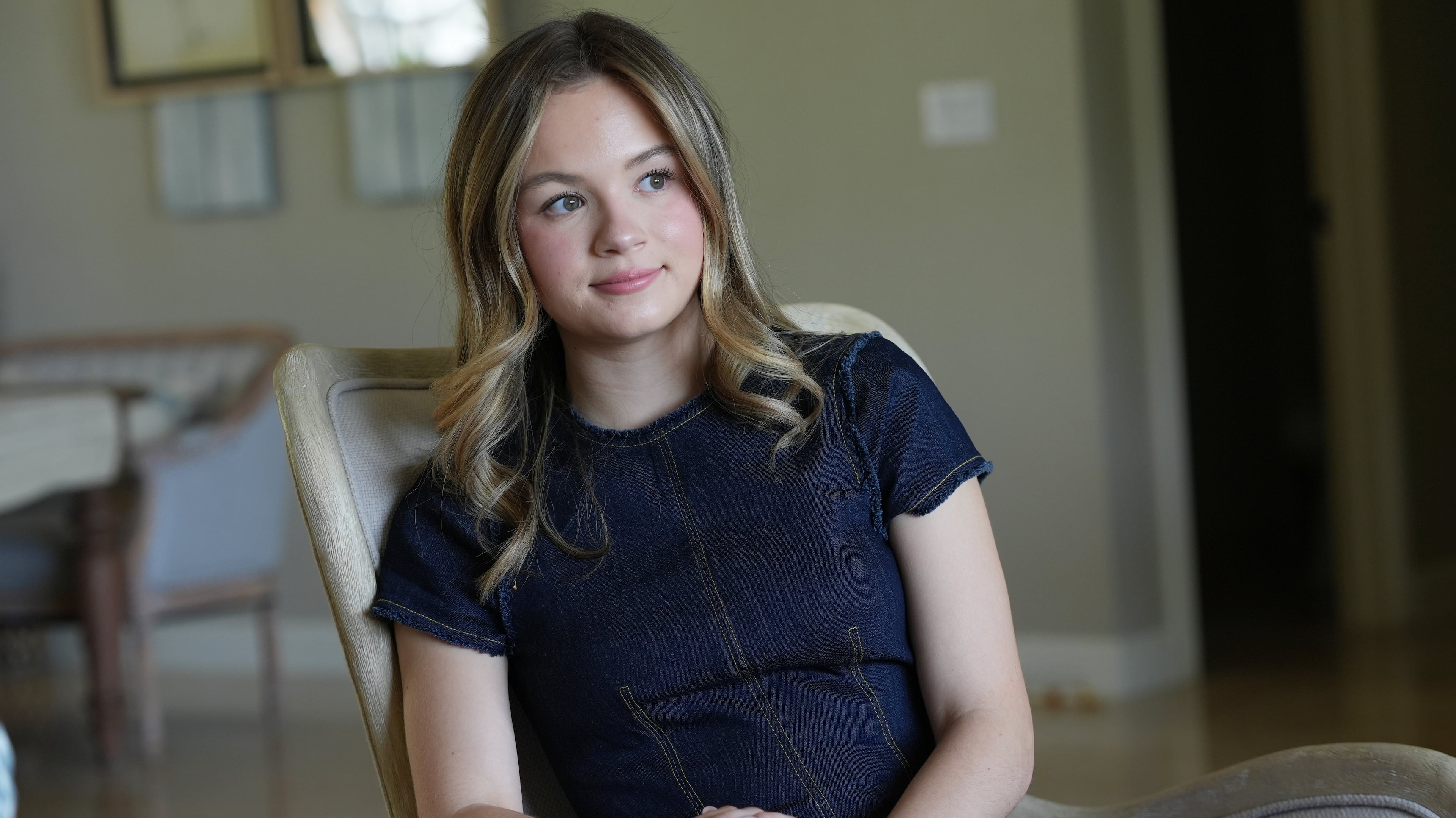 Lauryn Muller sits at her home Monday, April 13, 2026, in Coral Springs, Fla. (AP Photo/Marta Lavandier)