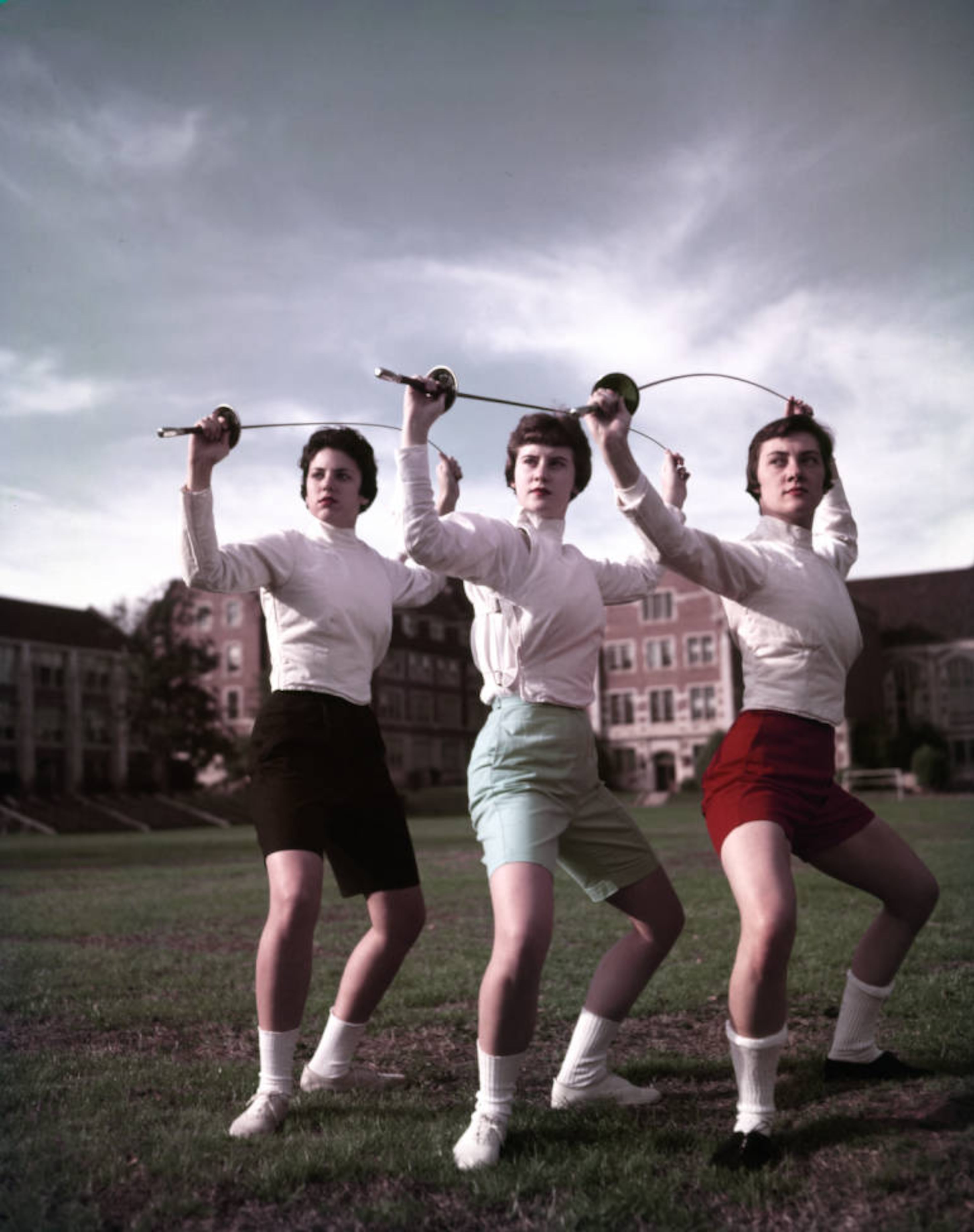 The original caption, from 1959: " The girls on our cover are members of a fencing class at Agnes Scott College in Decatur. The school isn't bent on teaching young ladies to defend themselves in this manner but offers fencing because it develops poise, stamina and agility. The young ladies, foils in hand, are Peggy Jo Wells of Monticello, Fla.; Beth Magoffin of Kingsport, Tenn., and Sarah Kelso of Atlanta. Photo by Kenneth Rogers."
