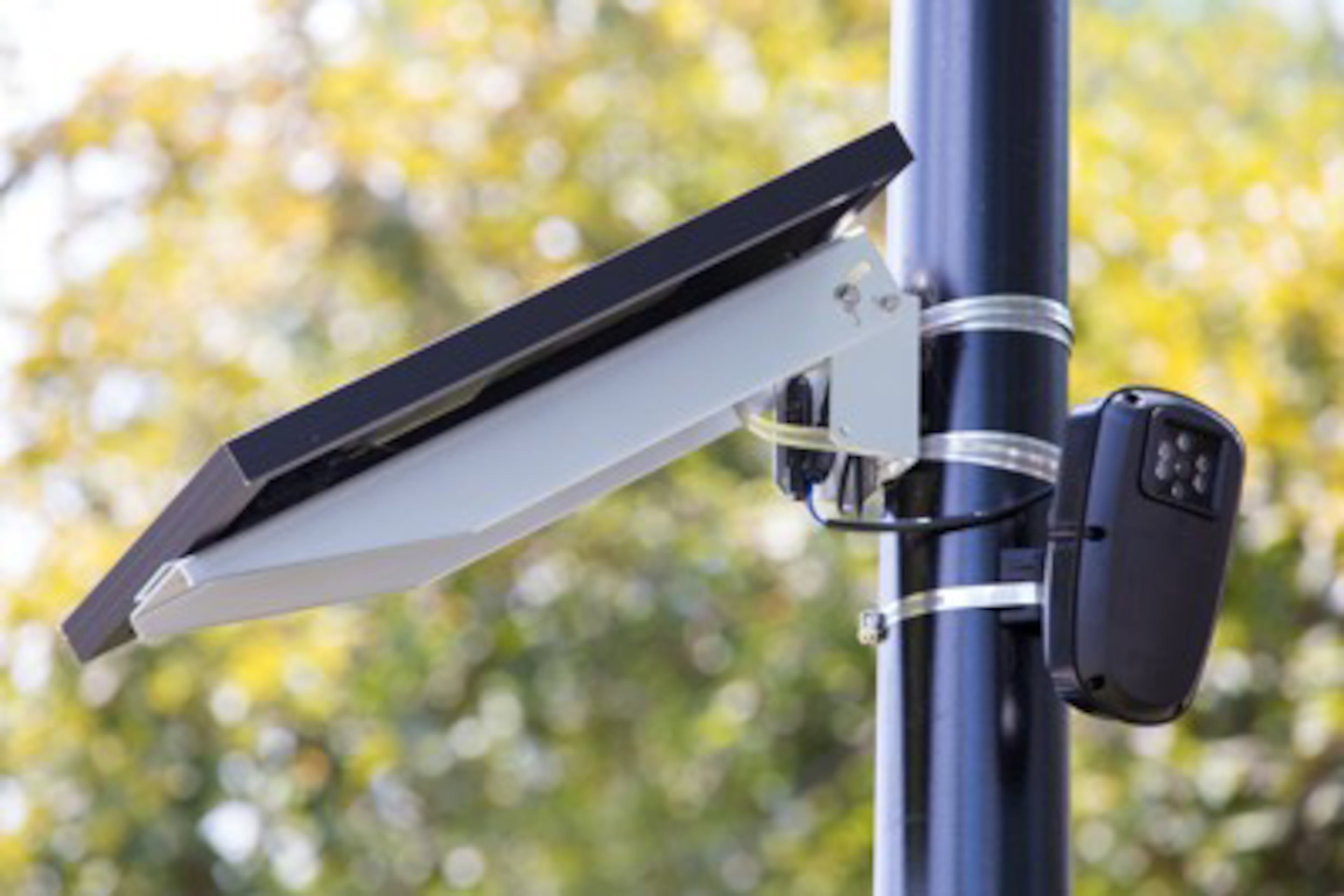 A Flock camera at work. Alpharetta has signed a five-year agreement with Flock Group Inc. to give police access to automated license plate reader data. CASEY SYKES / AJC FILE