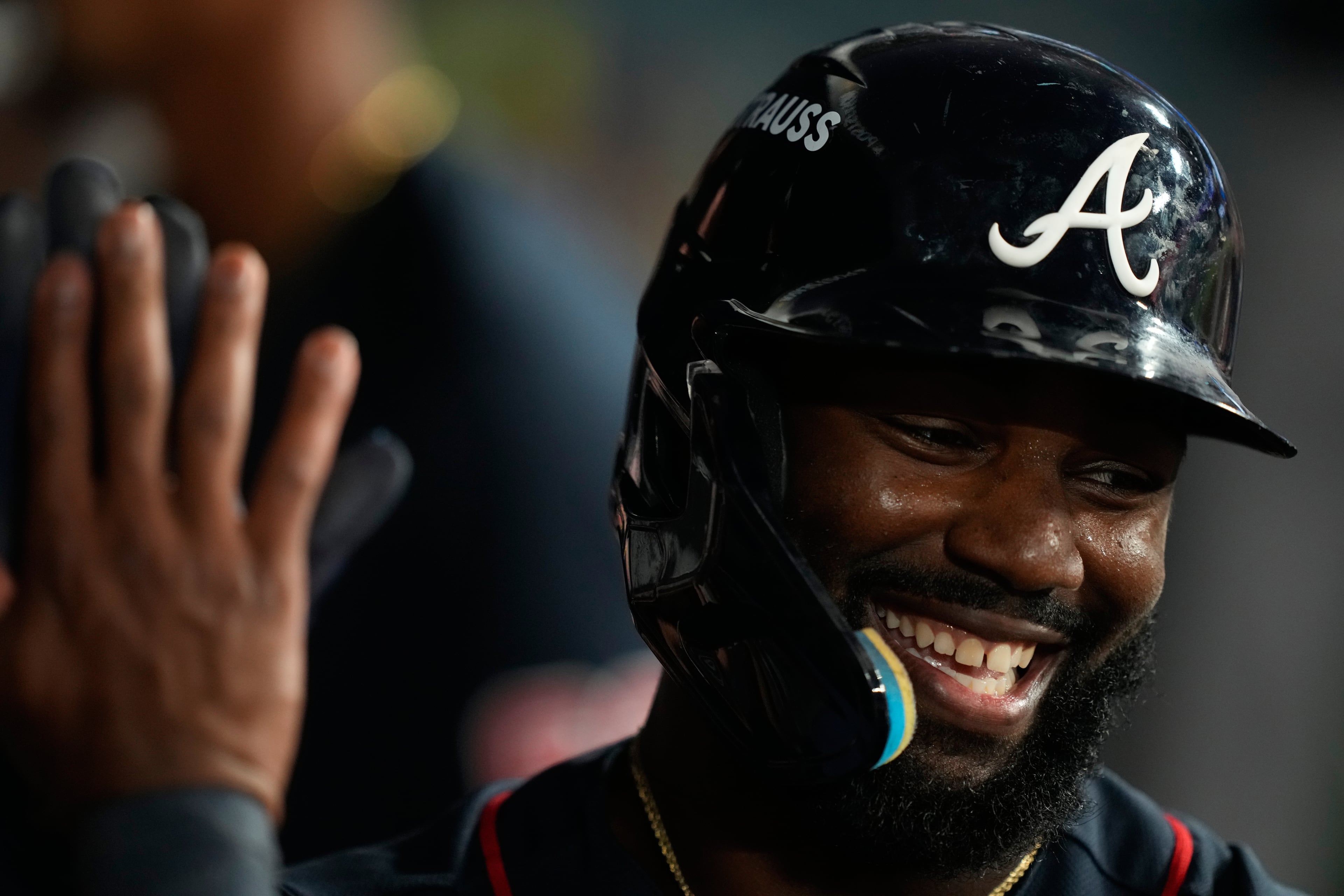 Atlanta Braves' Michael Harris II celebrates after scoring from third base off a wild pitch during the fifth inning of Game 2 of a National League Division Series baseball game against the Los Angeles Dodgers Sunday, Oct. 4, 2026, in Los Angeles. (AP Photo/Mark J. Terrill)