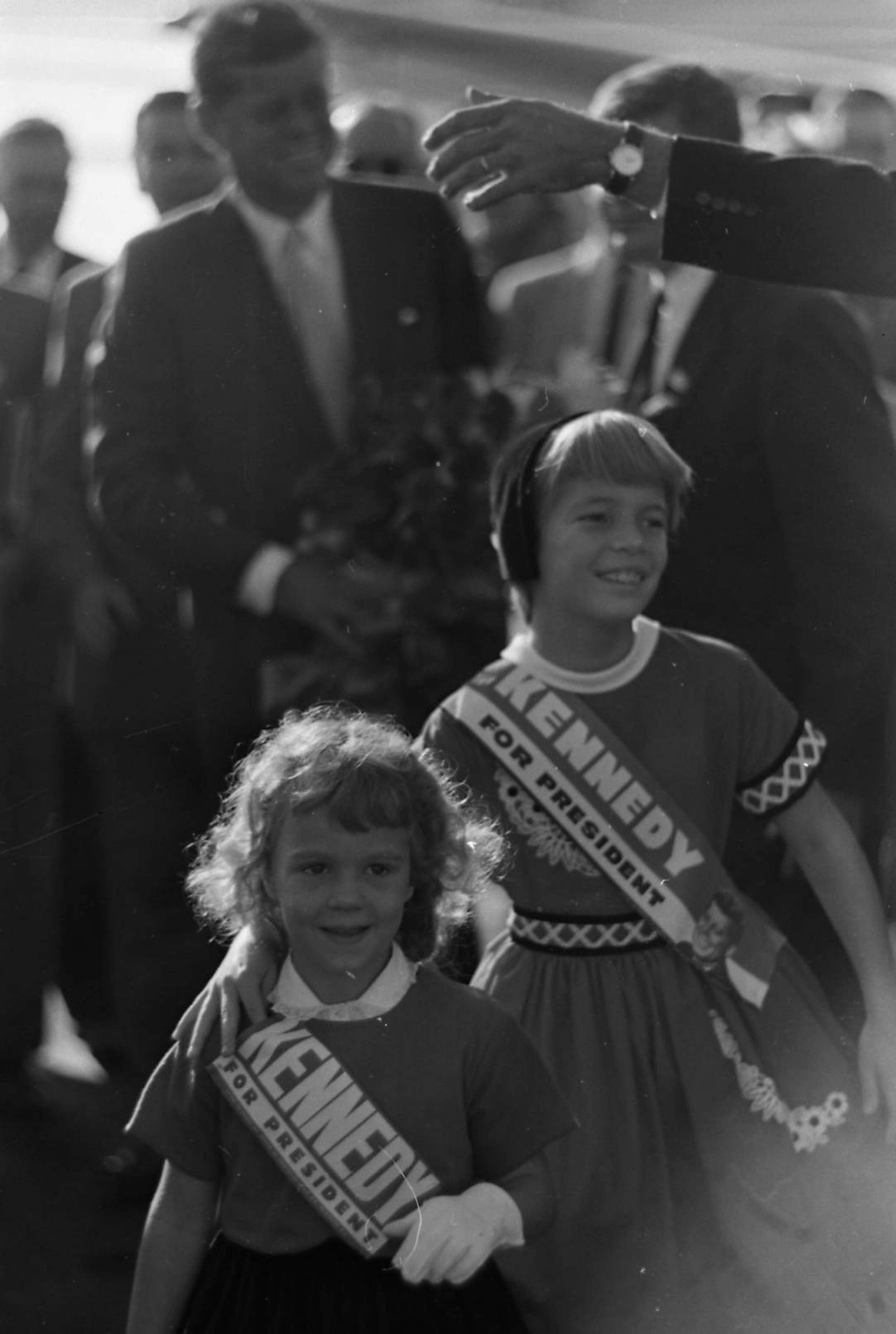 Youngsters got in on the act during Kennedy's campaign stop, too, decking themselves out in pro-JFK sashes during the candidate's appearance.