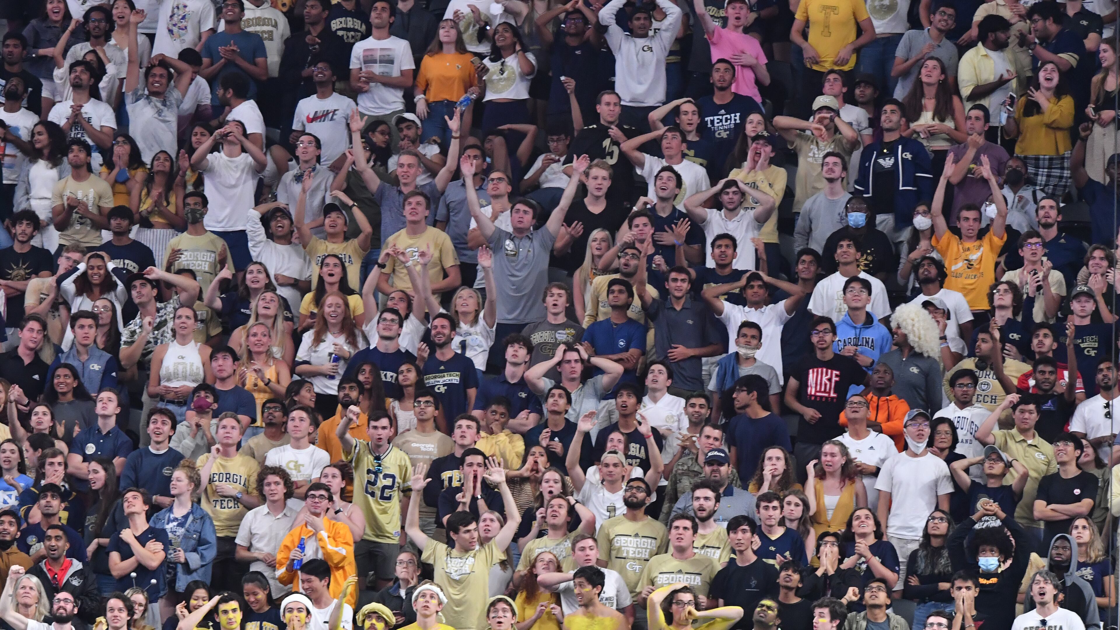 September 25, 2021 Atlanta - Georgia Tech fans cheer for their team during the second half of an NCAA college football game at Mercedes-Benz Stadium in Atlanta on Saturday, September 25, 2021. Georgia Tech won 45-22 over North Carolina. (Hyosub Shin / Hyosub.Shin@ajc.com)
