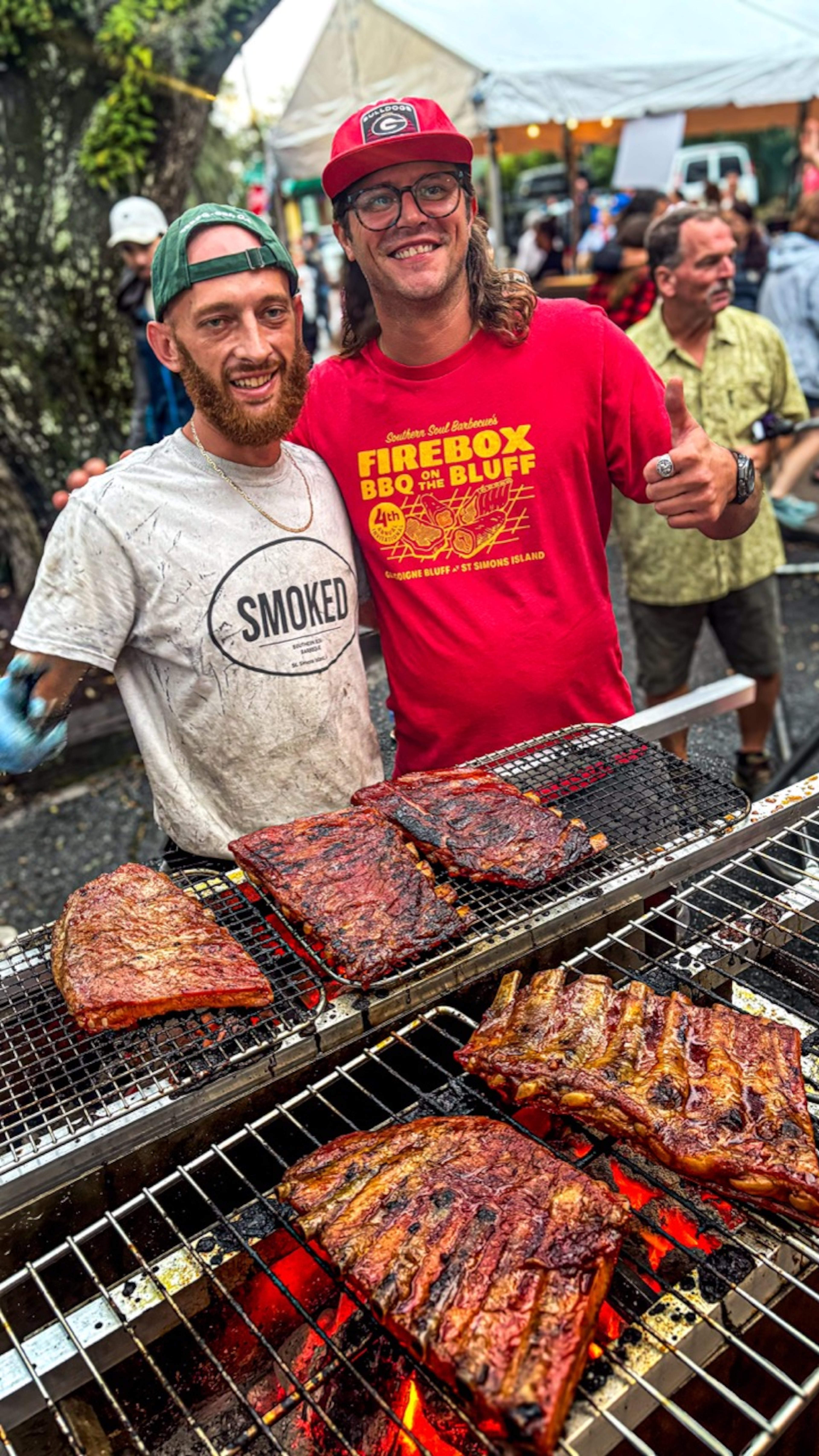 Ian Griffith (left) and Aaron Reise of Southern Soul Barbeque get to grilling at the Firebox Initiative's BBQ on the Block in 2024. (Courtesy of Firebox Initiative)