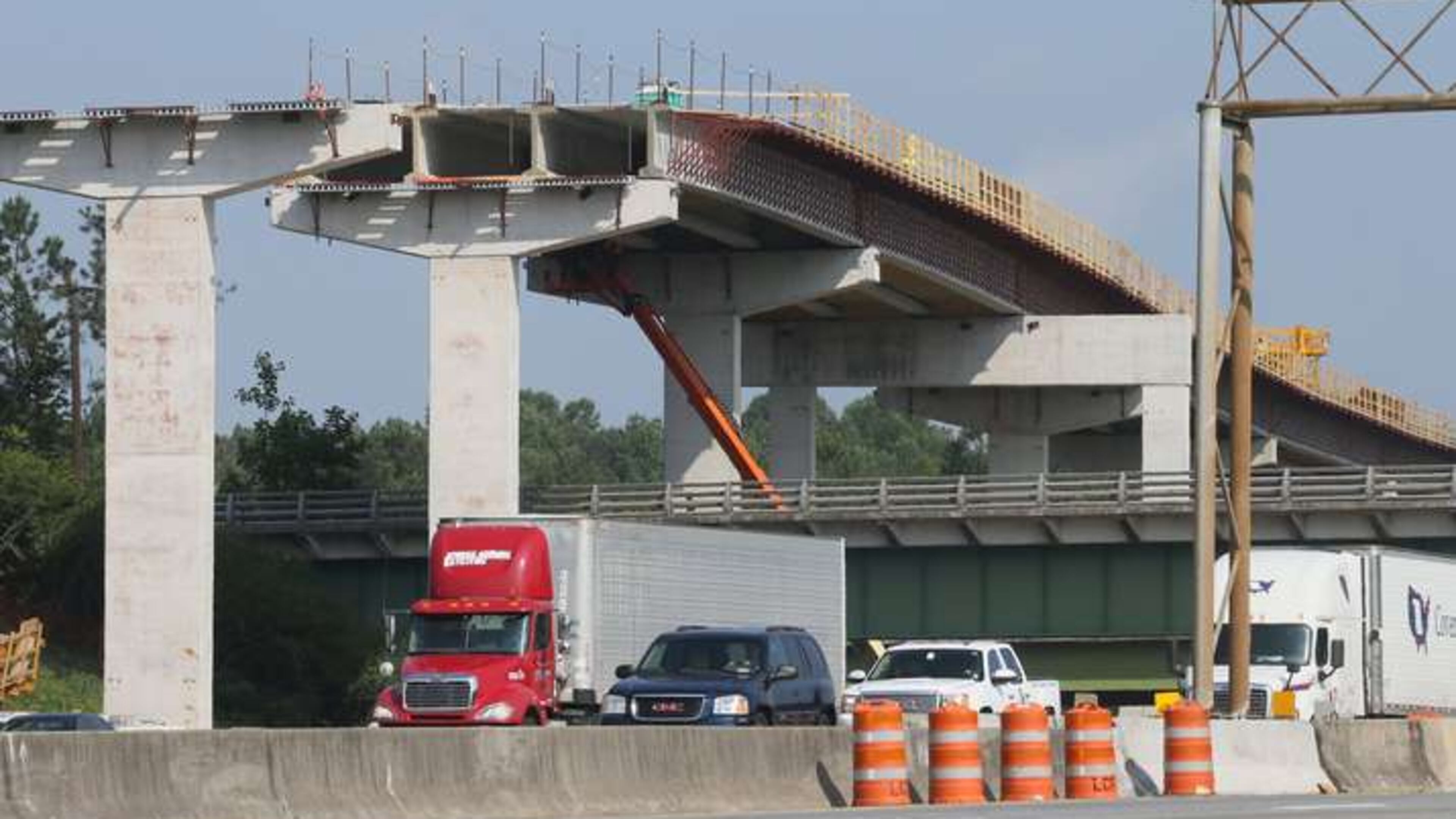 Construction continues on the Northwest Corridor managed lanes. (AJC Photo / Bob Andres)