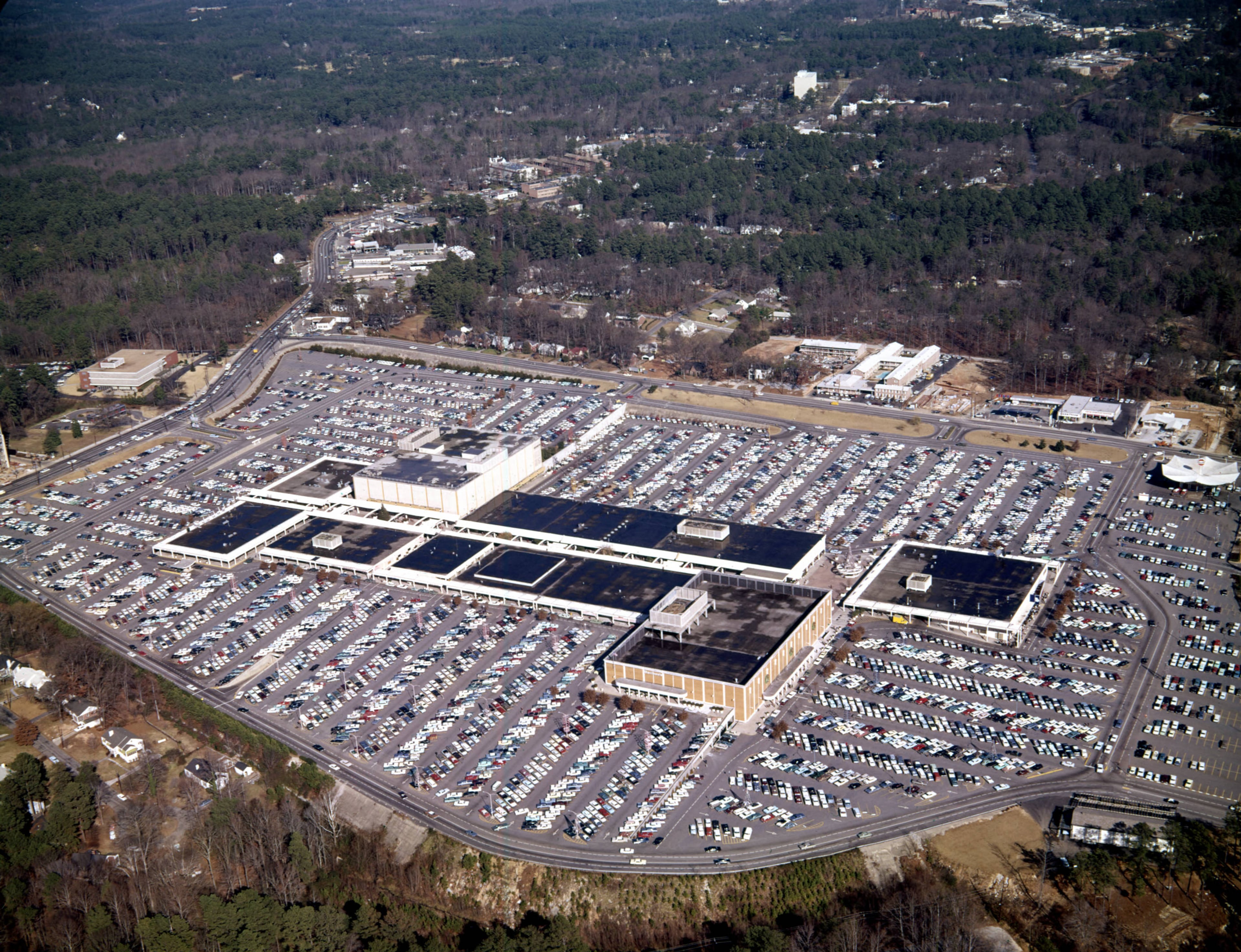 Aerial view of Lenox Square and its surrounding parking lot, looking northeast, Buckhead, Atlanta, Georgia, December 21, 1965.