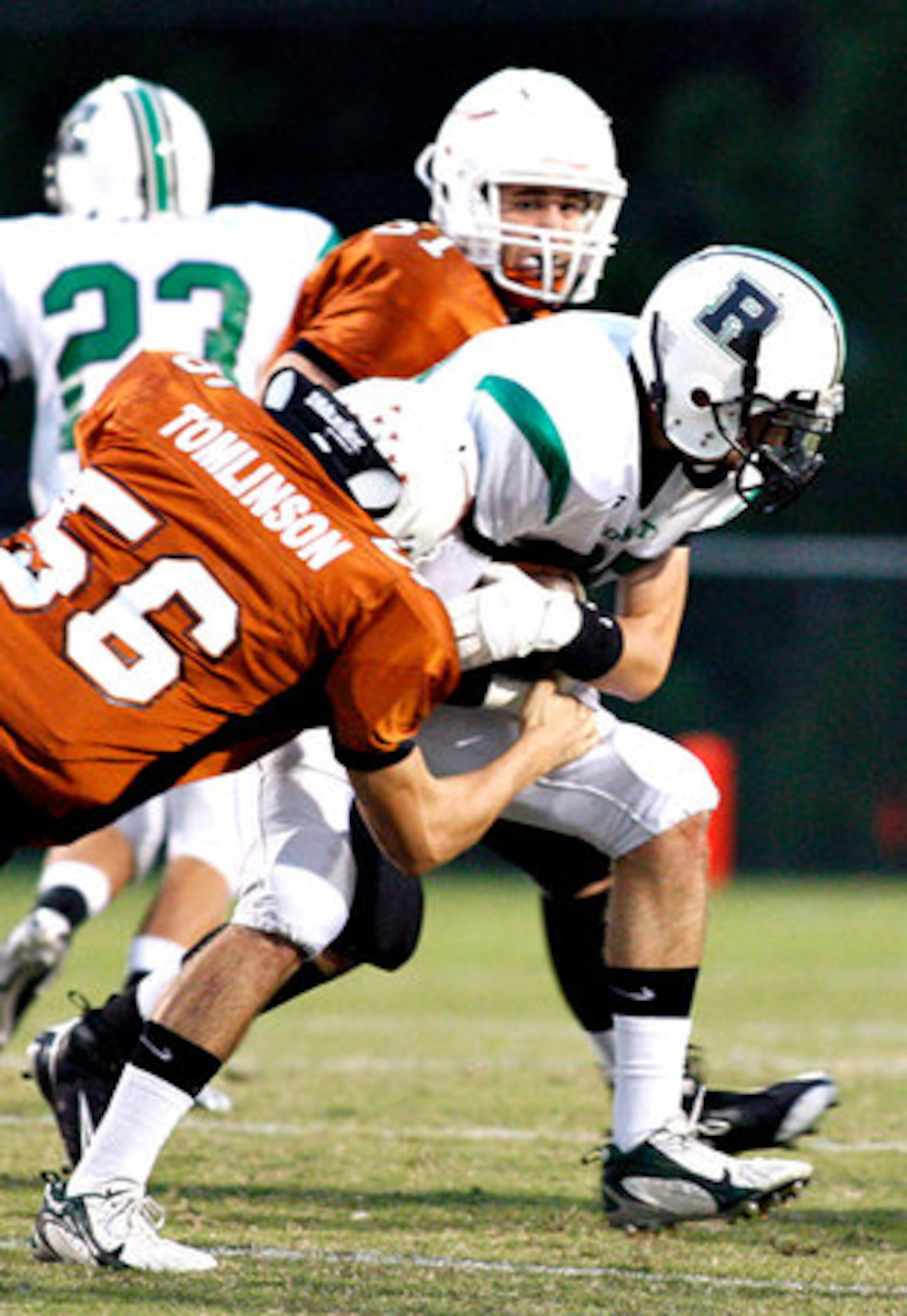 Kell's Cody Tomlinson needs to stop Roswell's Keegan Hughes.