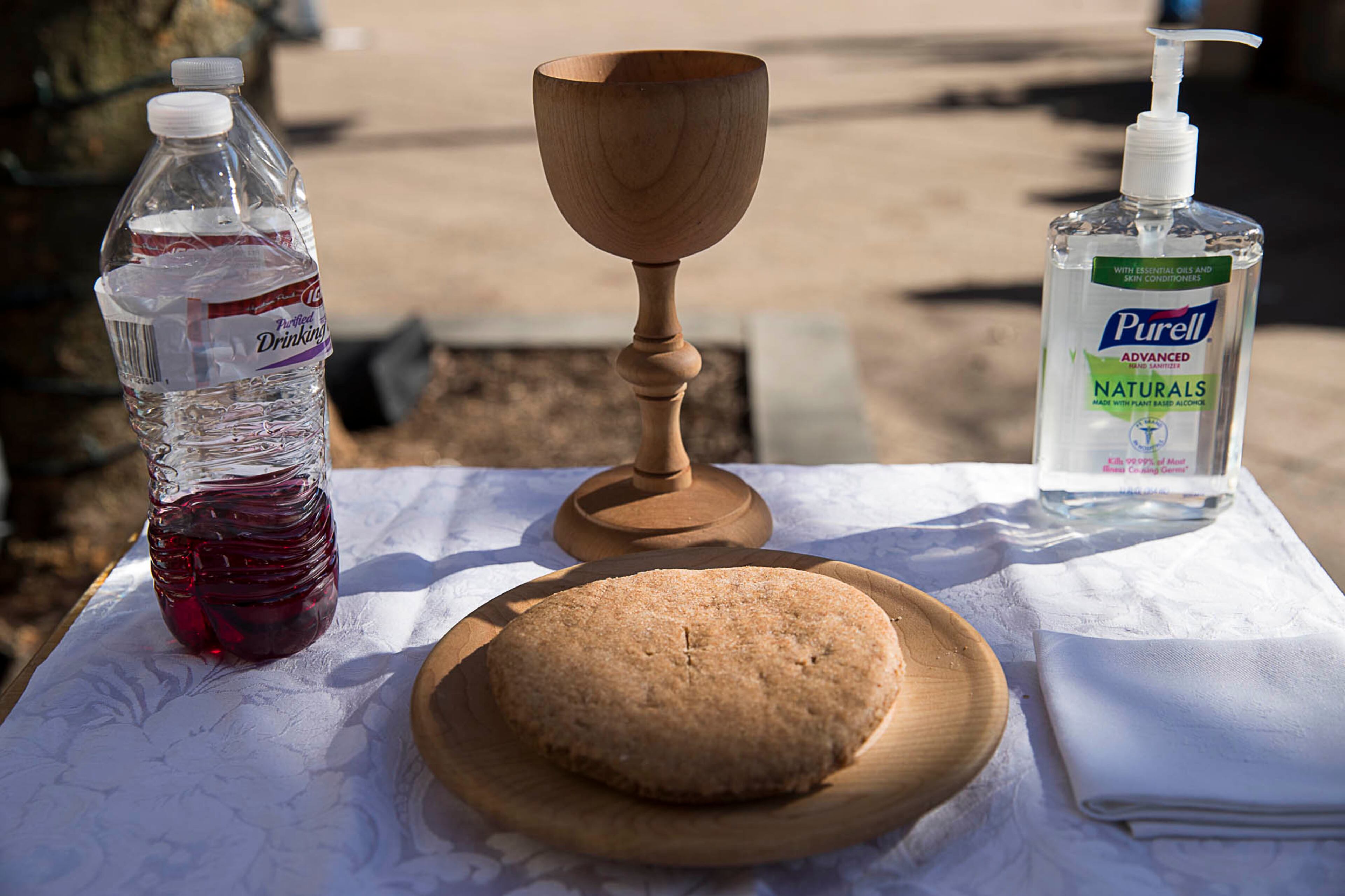 12/24/2018 -- Atlanta, Georgia -- Holy Communion is prepared for service during a Church of the Common Ground Christmas Eve sermon for the homeless at Woodruff Park in Atlanta, Monday, December 24, 2018. (ALYSSA POINTER/ALYSSA.POINTER@AJC.COM)