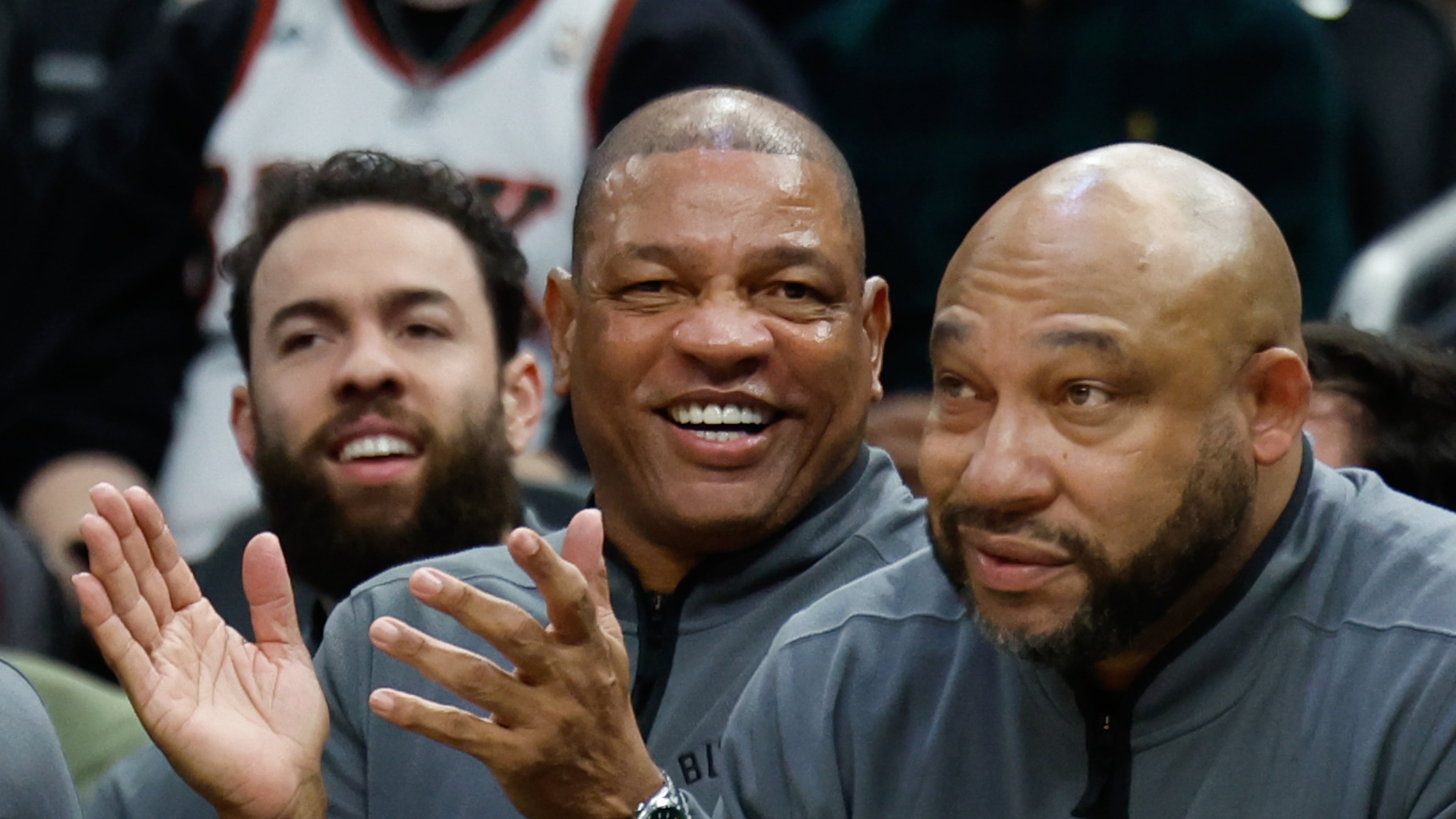 FILE - Milwaukee Bucks head coach Doc Rivers, center, applauds during the first half of an NBA basketball game against the Dallas Mavericks, March 31, 2026, in Milwaukee. (AP Photo/Jeffrey Phelps, File)