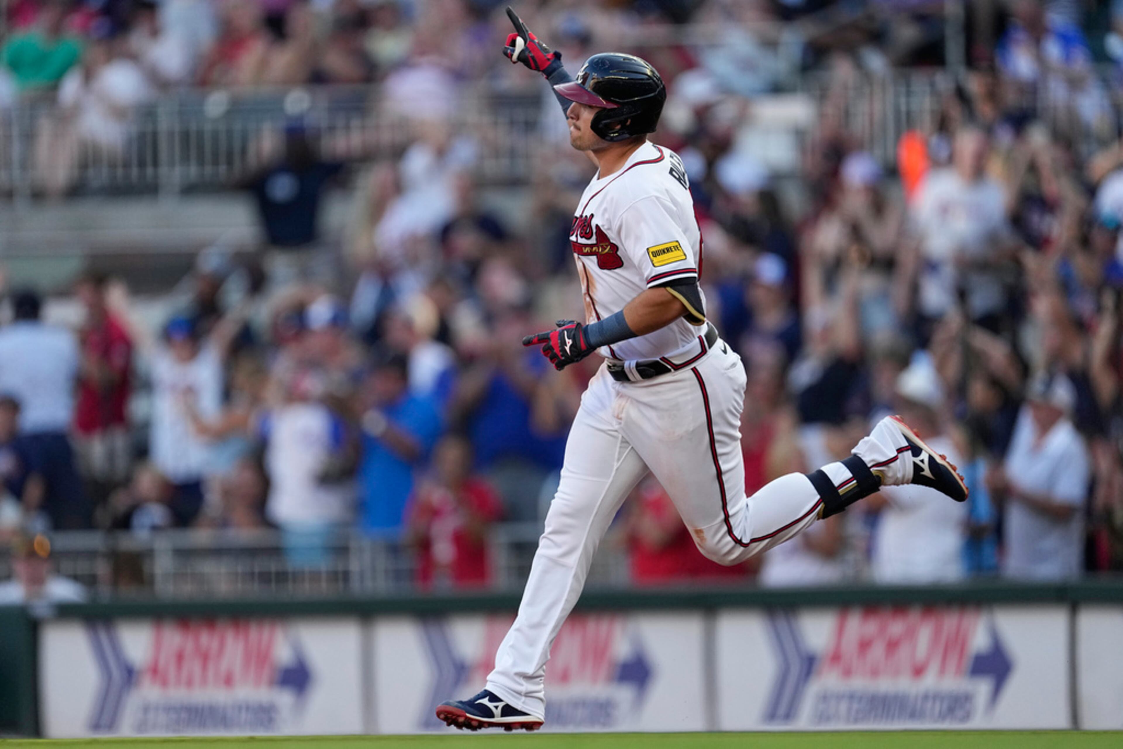 Atlanta Braves' Austin Riley gestures after hitting a two-run home run against the Minnesota Twins during the first inning of a baseball game Tuesday, June 27, 2023, in Atlanta. (AP Photo/John Bazemore)