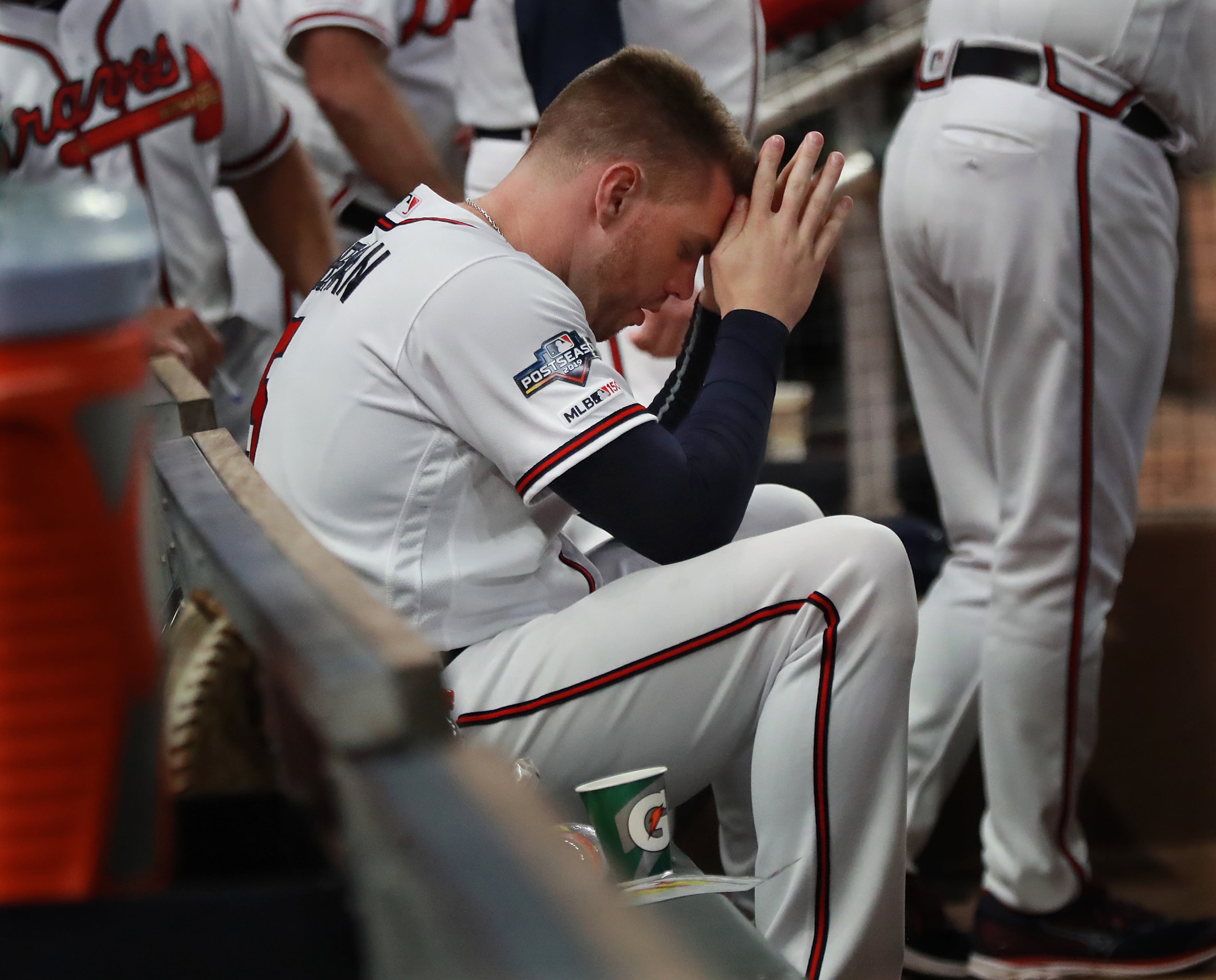 Braves first baseman Freddie Freeman sits dejected in the dugout in the 9th inning. Curtis Compton/ccompton@ajc.com
