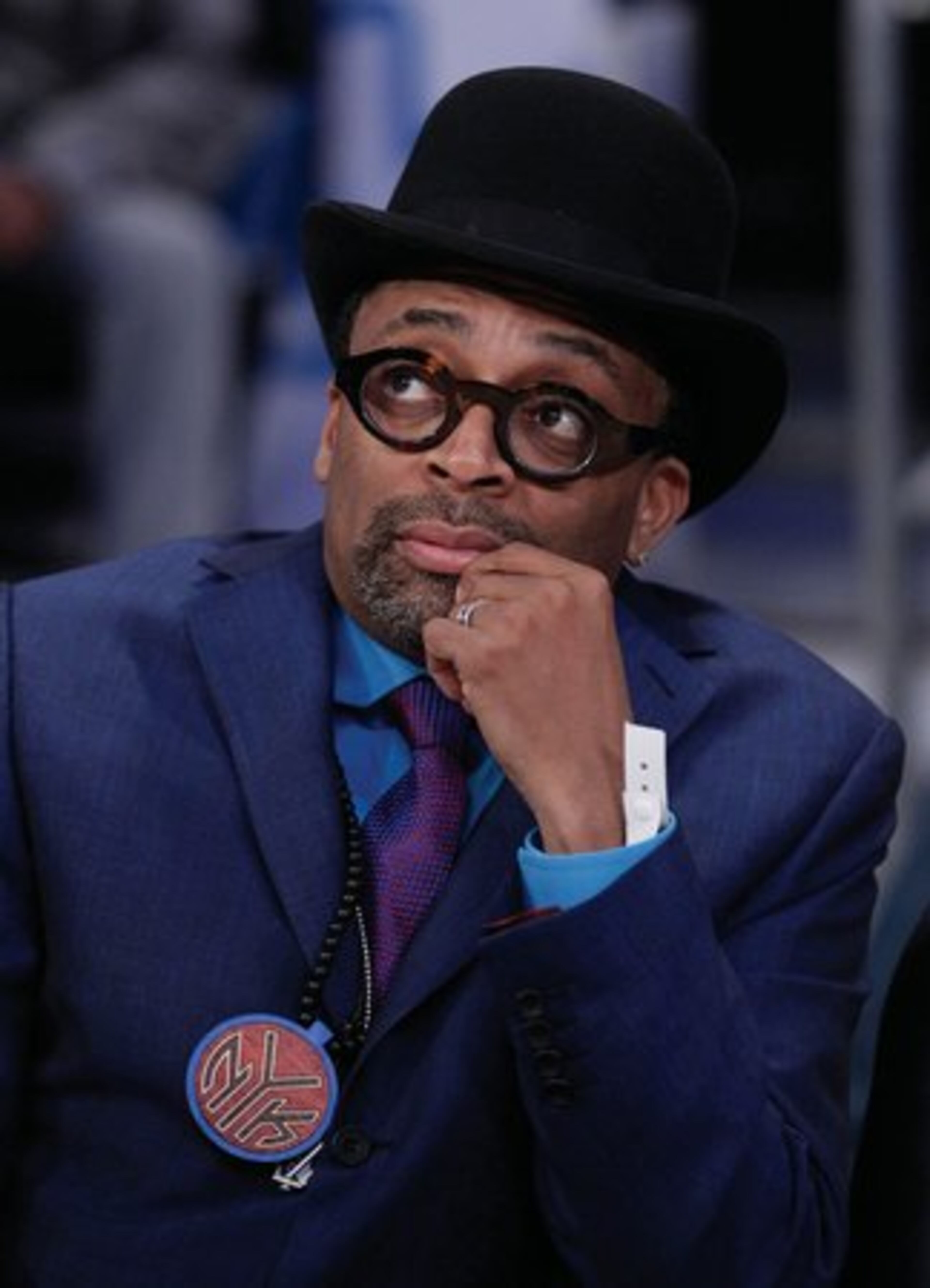 Director Spike Lee waits for the start of the NBA basketball All-Star Game.