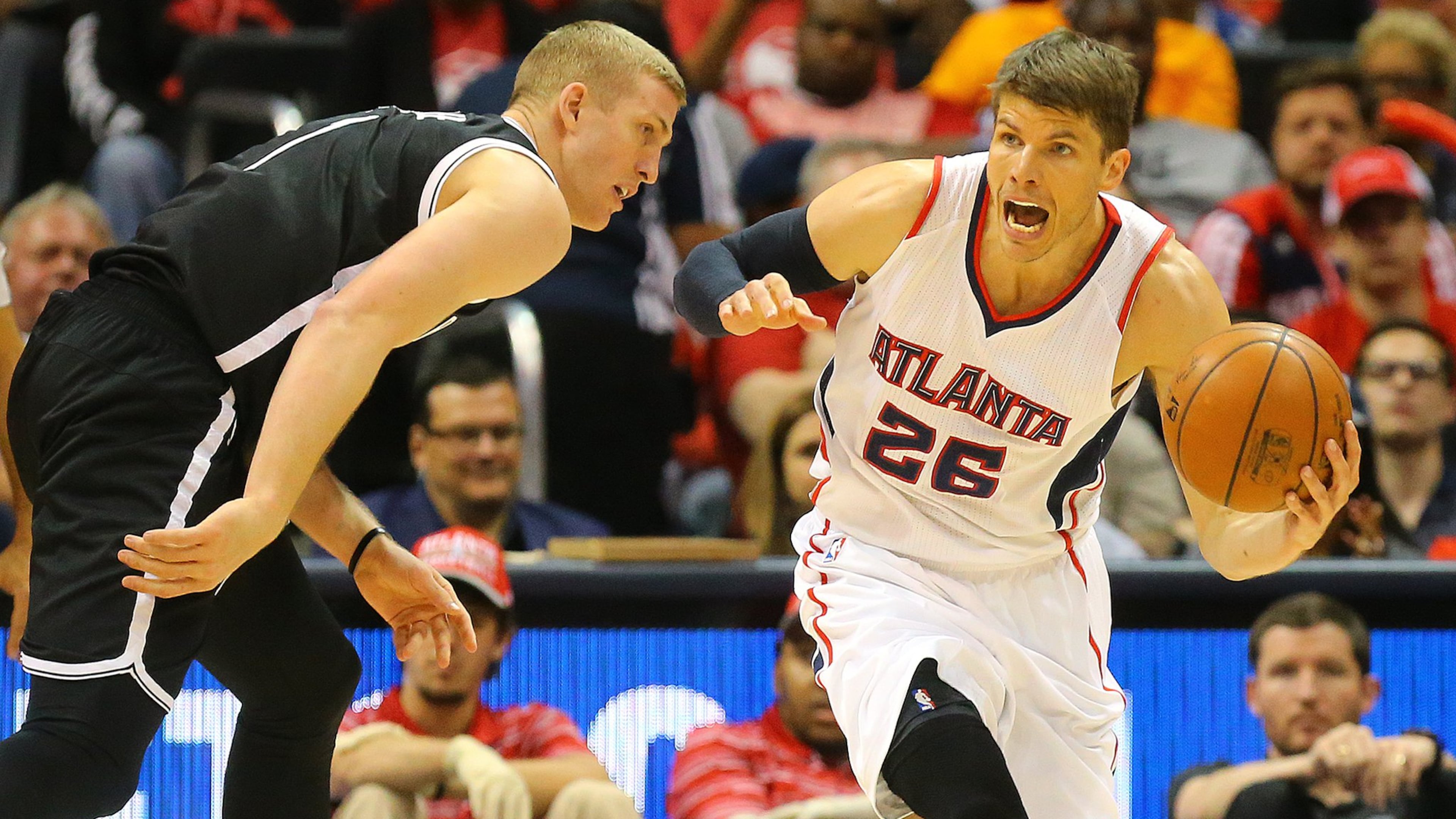 Hawks’ Kyle Korver steals from Nets Mason Plumlee during an NBA playoff basketball game on Sunday, April 19, 2015, in Atlanta. Curtis Compton / ccompton@ajc.com