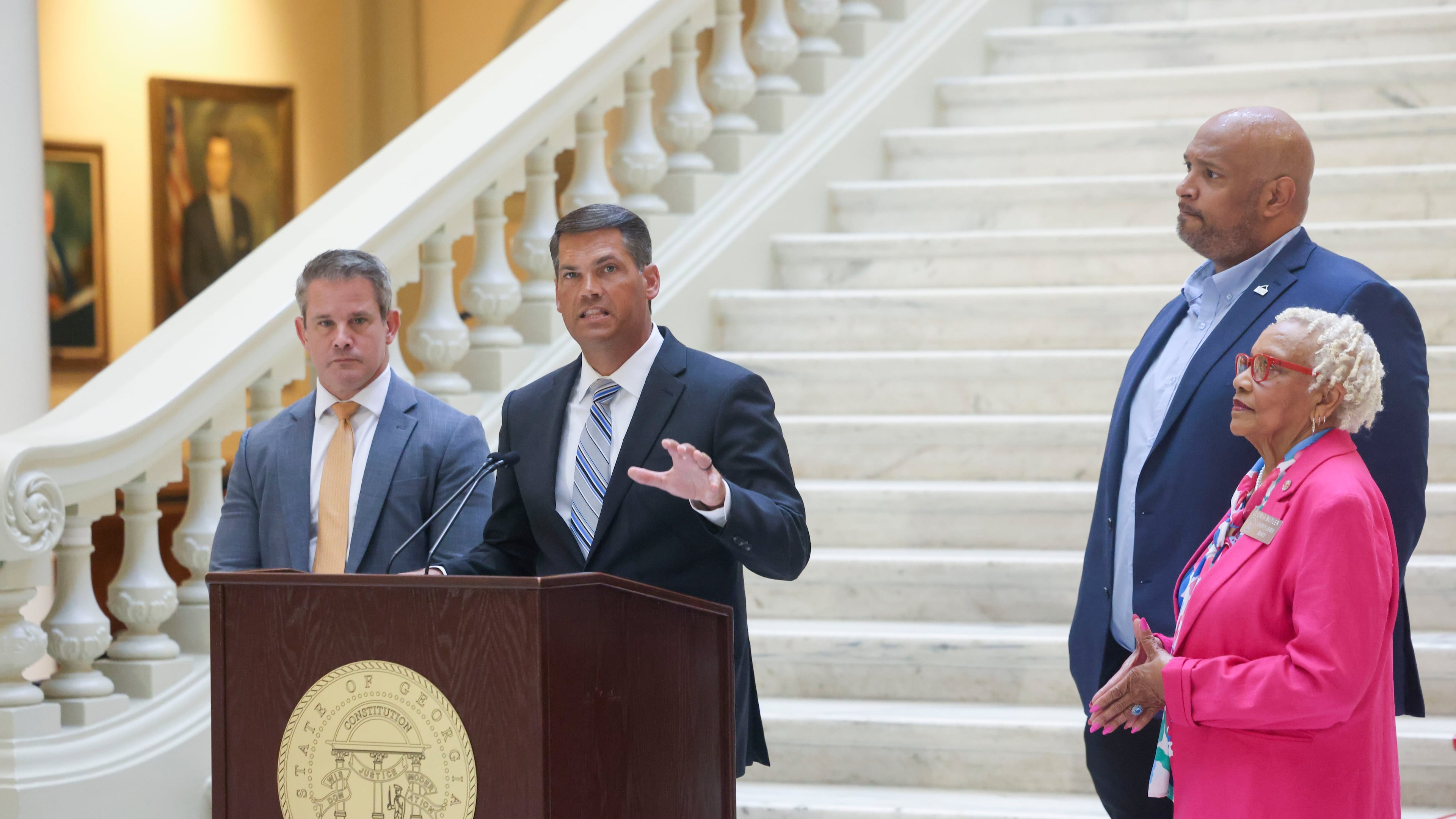 Former Republican Lt. Gov. Geoff Duncan (center, standing next to former Illinois Congressman Adam Kinzinger) now says his values align better with the Democrats than the GOP. Readers had a lot to say about his switch. (Jason Getz/The Atlanta Journal-Constitution/TNS)