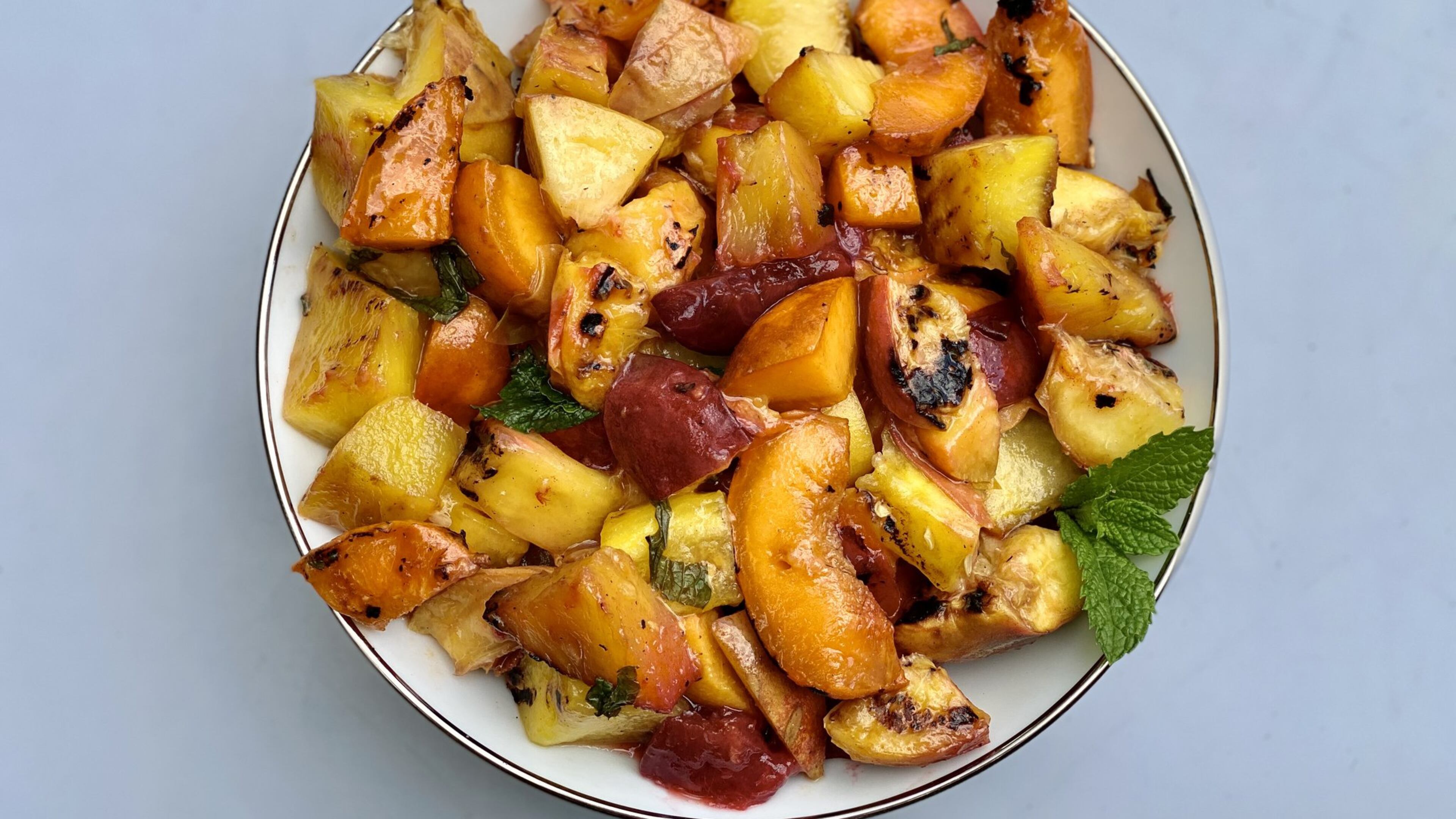 Fourth of July barbecue? Add fresh fruit to the menu and the grill. CONTRIBUTED BY KELLIE HYNES