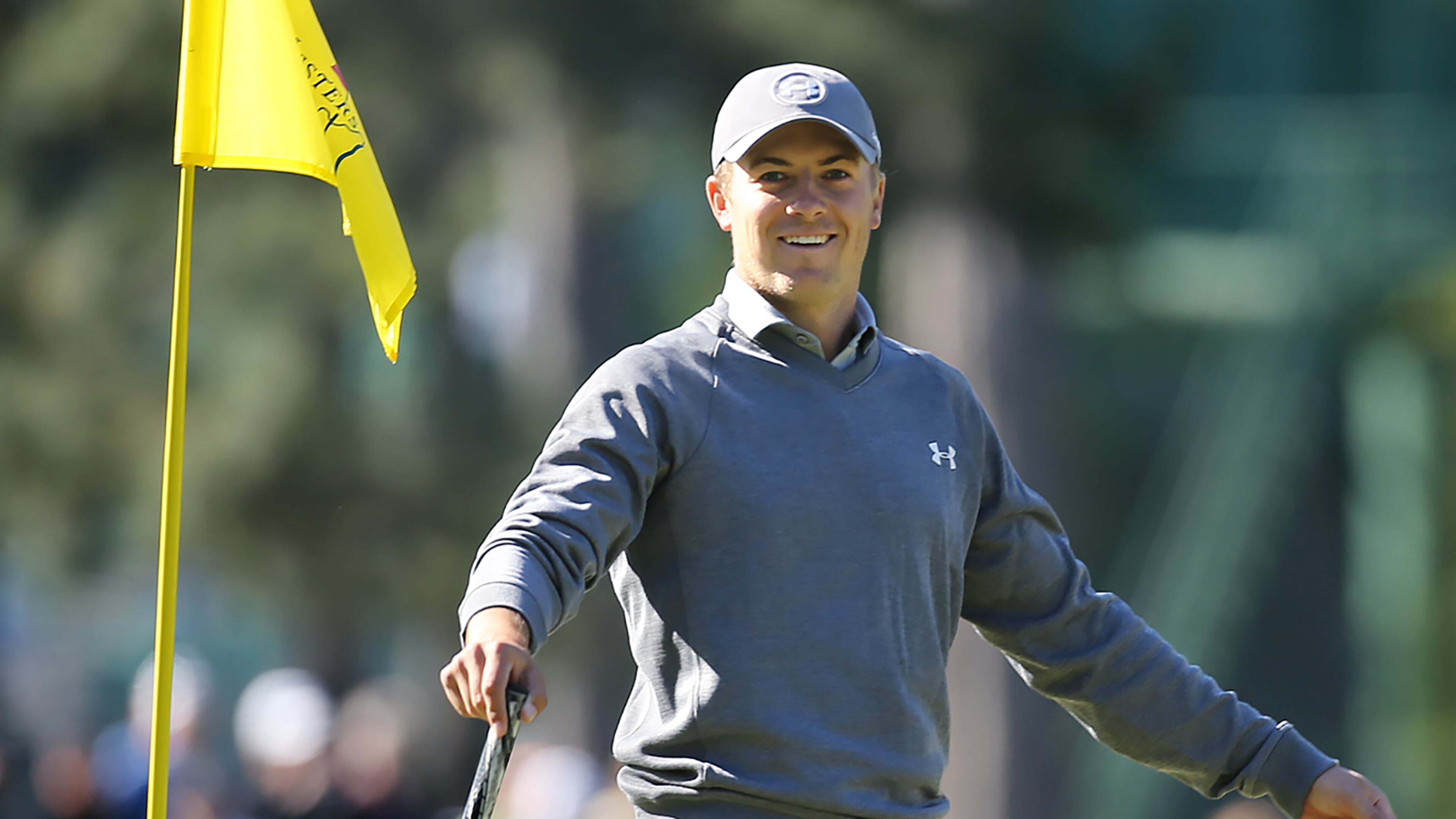 Masters defending champion Jordan Spieth is all smiles reacting to the crowd while putting on the third hole during his practice round for the Masters at Augusta National Golf Club on Tuesday, April 5, 2016, in Augusta. Curtis Compton / ccompton@ajc.com