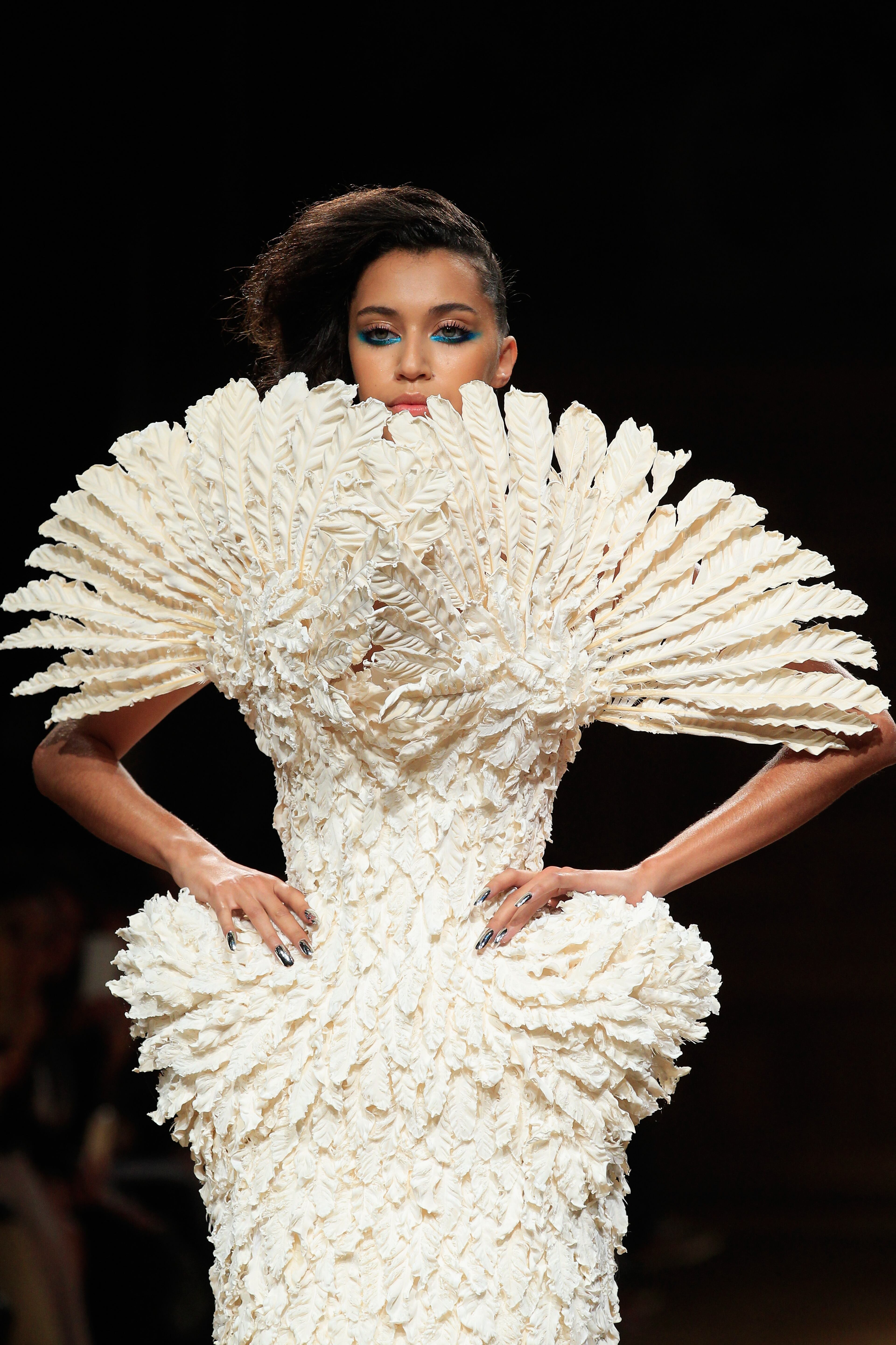 PARIS, FRANCE - JULY 10: A model walks the runway during the Serkan Cura show as part of Paris Fashion Week - Haute Couture Fall/Winter 2014-2015 at Mairie du 4e on July 10, 2014 in Paris, France. (Photo by Thierry Chesnot/Getty Images)