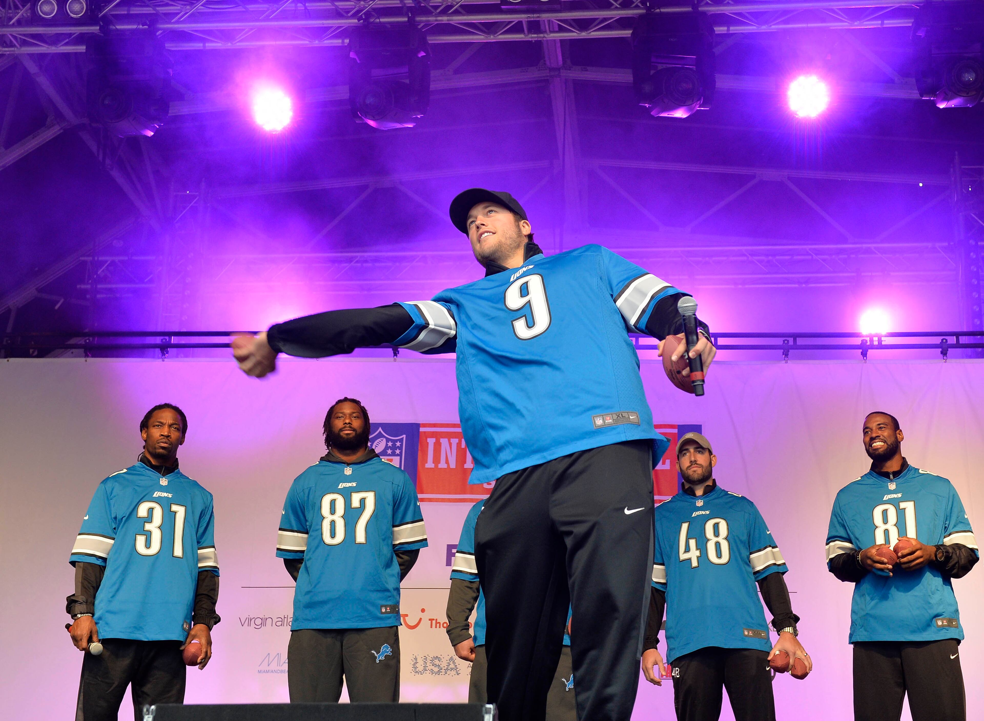QB Matthew Stafford of the Detroit Lions throws a ball into the crowd. Sean Ryan /NFL