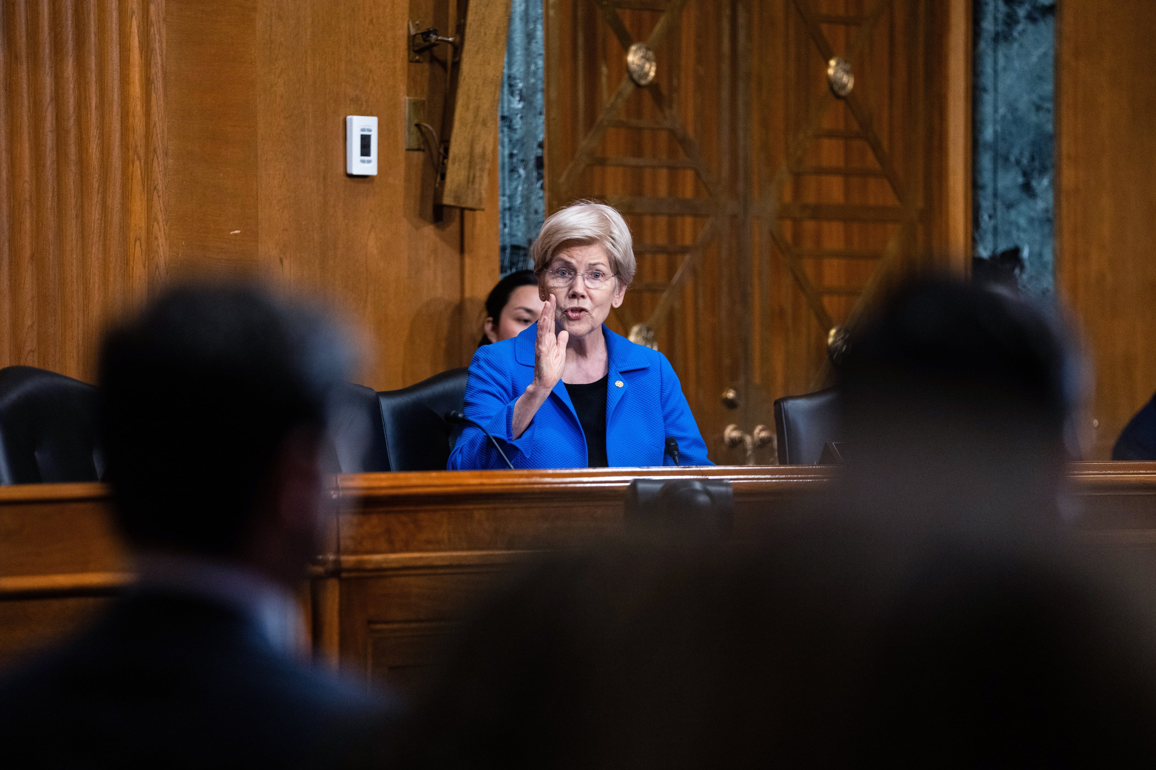 U.S. Sen. Elizabeth Warren, D-Mass., seen here in June asking questions before the Senate Committee on Finance hearing to examine President Donald Trump's proposed budget request for fiscal year 2027. (Allison Robbert/AP)