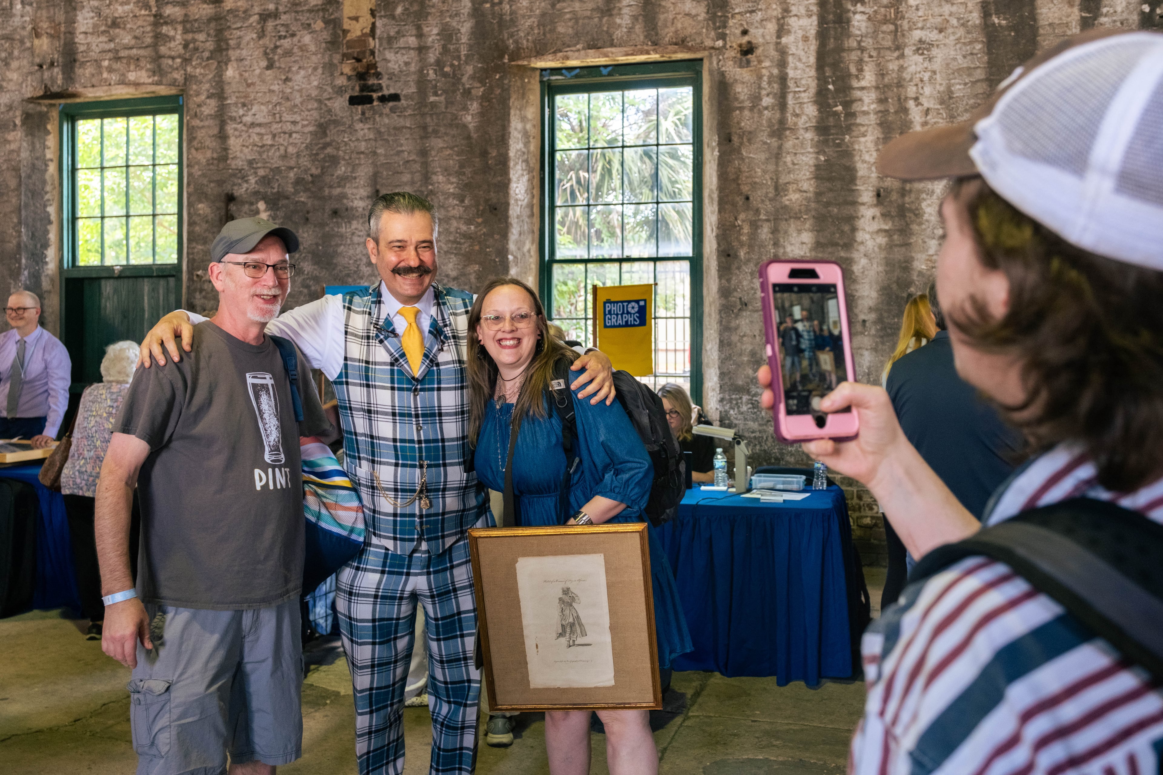Nicholas Lowry poses with fans at the "Antiques Roadshow" in Savannah, GA, on April 29, 2025. (Justin Taylor for The Atlanta Journal-Constitution)