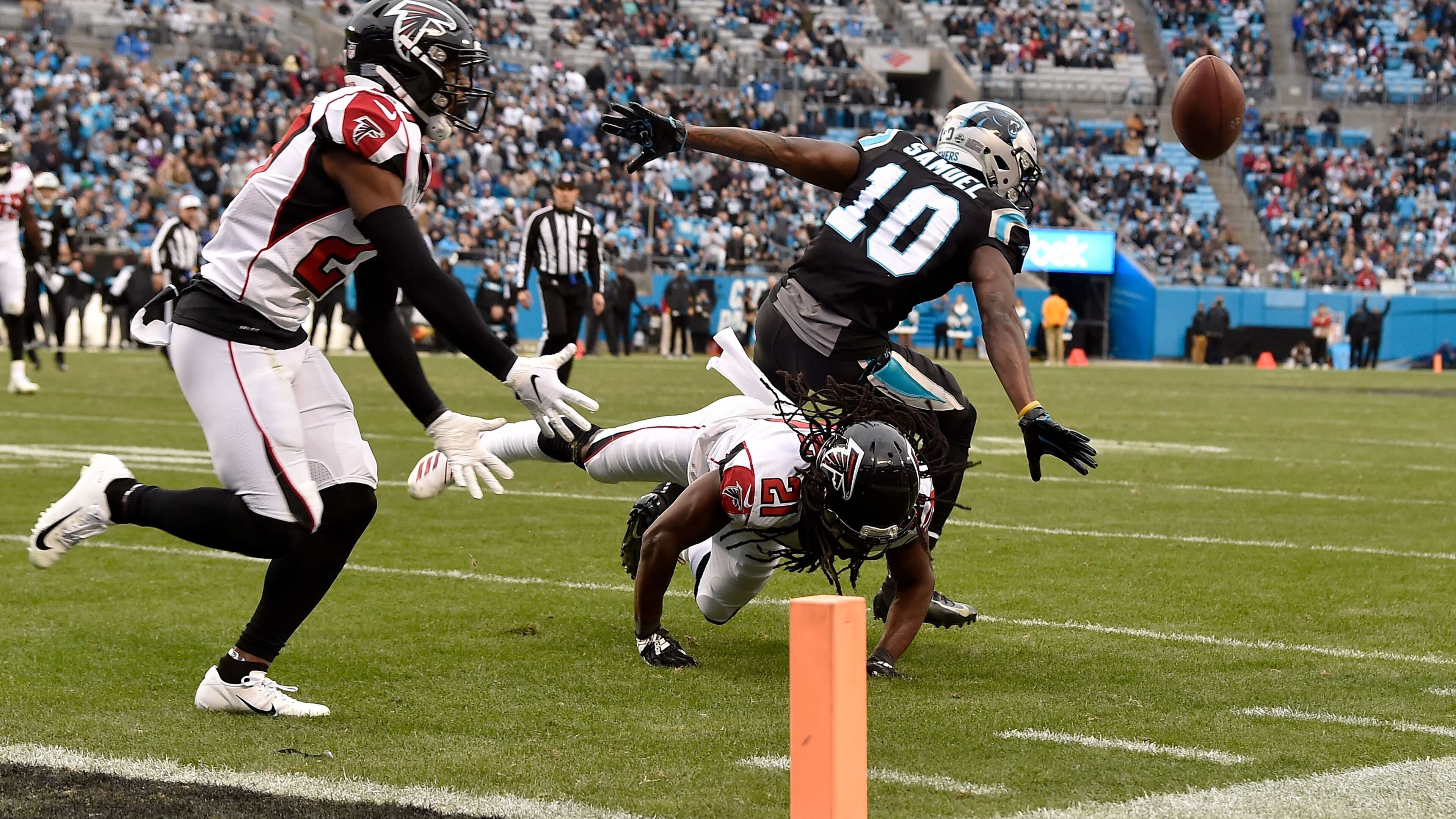 Falcons’ Desmond Trufant (21) breaks up a pass to Carolina’s Curtis Samuel in the fourth quarter Sunday, Dec. 23, 2018, at Bank of America Stadium in Charlotte, N.C.