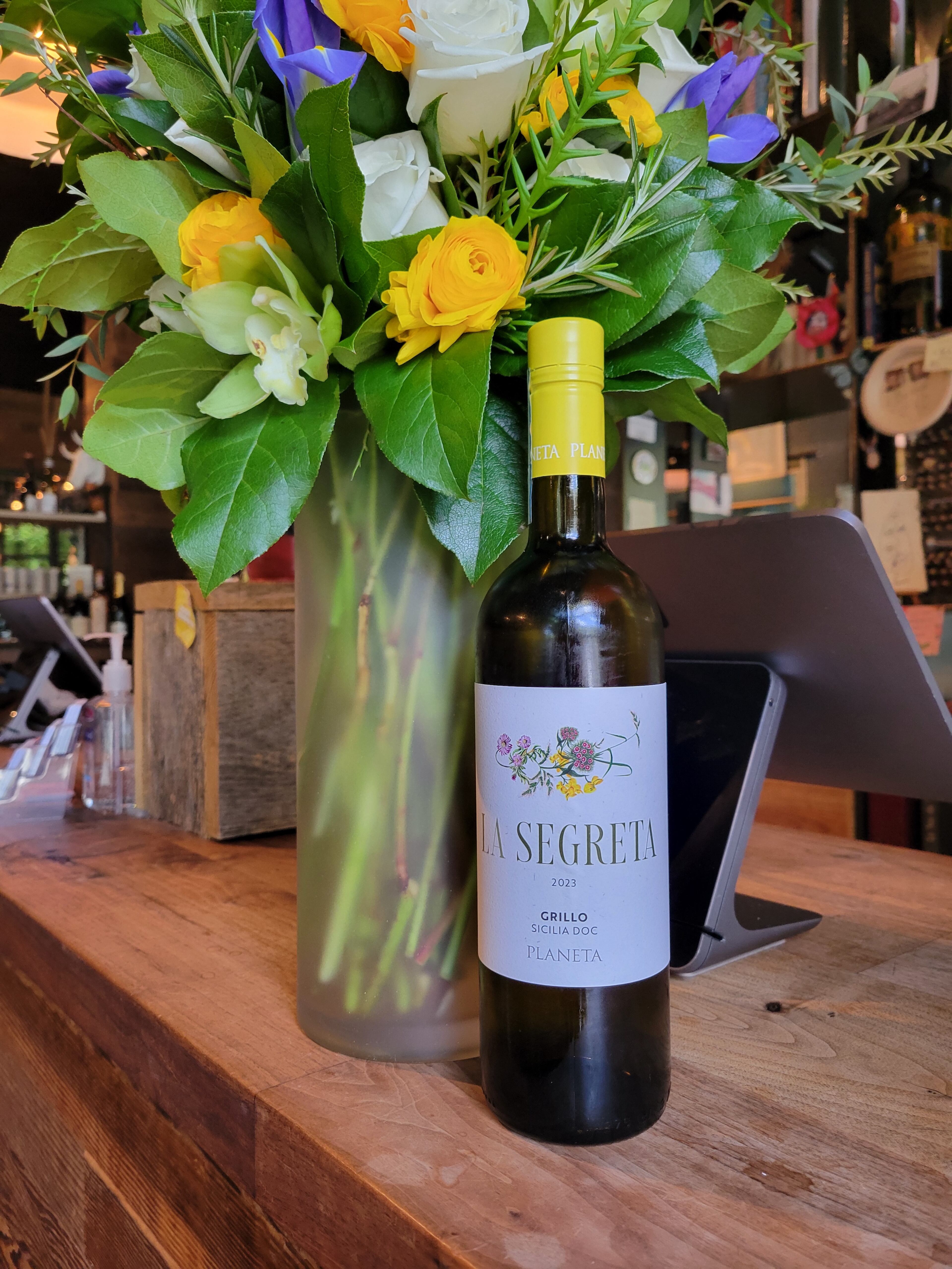 VinoTeca sommelier and wine buyer Janeen Jason finds the salty citrus fruit and acidity of Planeta La Segreta from Sicily an accessible complement to lemon pepper wet wings. (Courtesy of Janeen Jason)