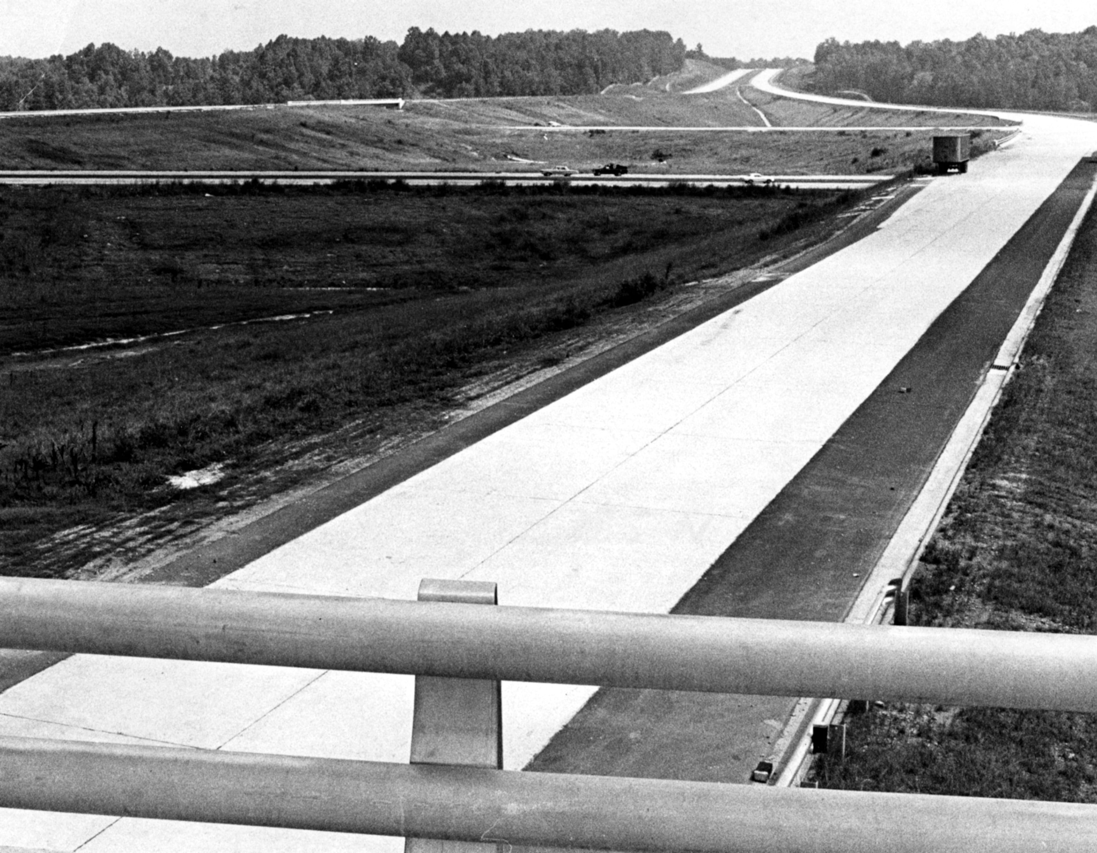 Aug. 1968 - I-285 streteches north into the distance while I-20 vehicle traffic passes beneath (middle of photo), Atlanta would be to the left side of the photo.