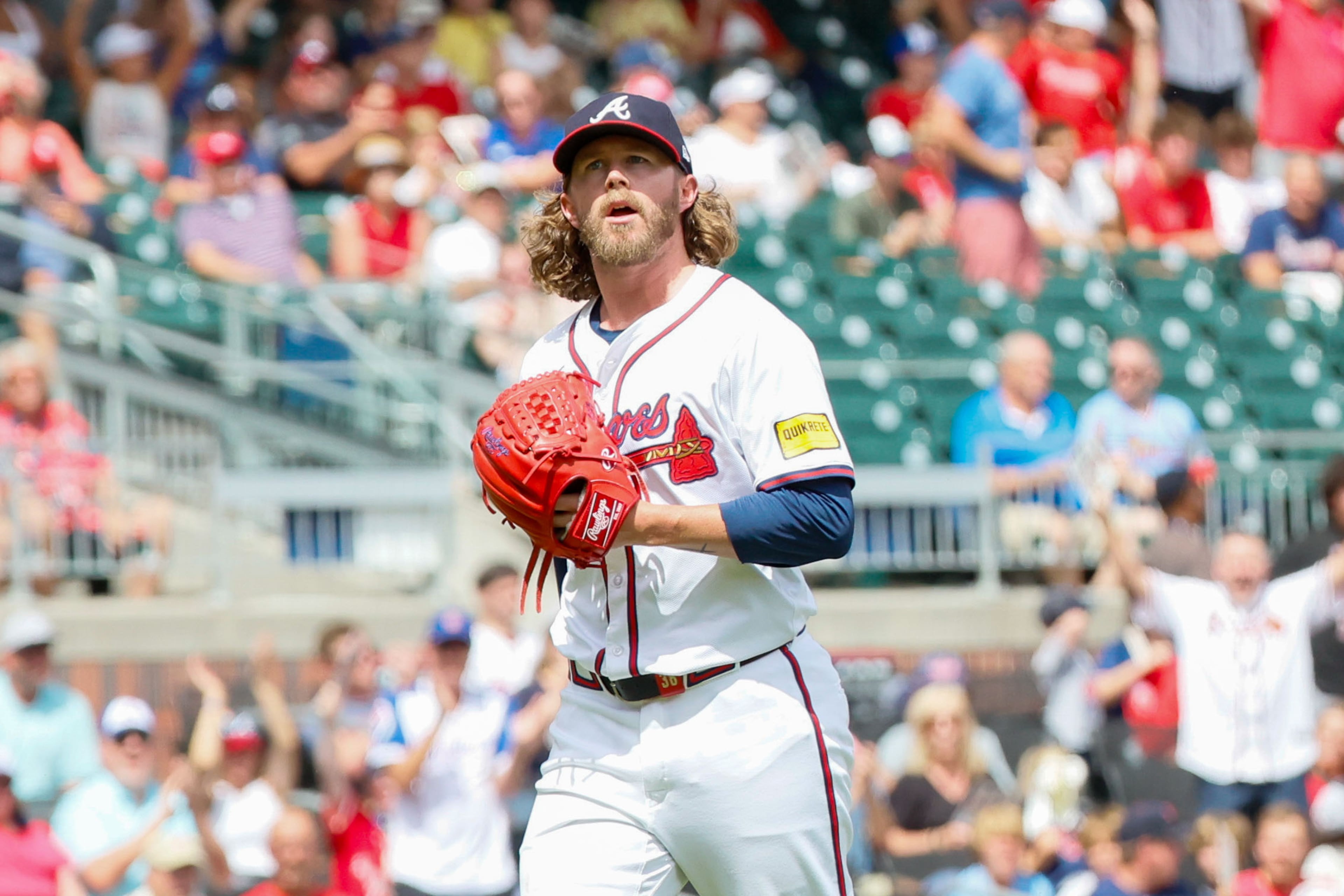 Atlanta Braves relief pitcher Pierce Johnson (38) reacts after finishing the 10th inning against a St. Louis Cardinals Truist Park in Atlanta on Saturday, July 20, 2024.
(Miguel Martinez/ AJC)
