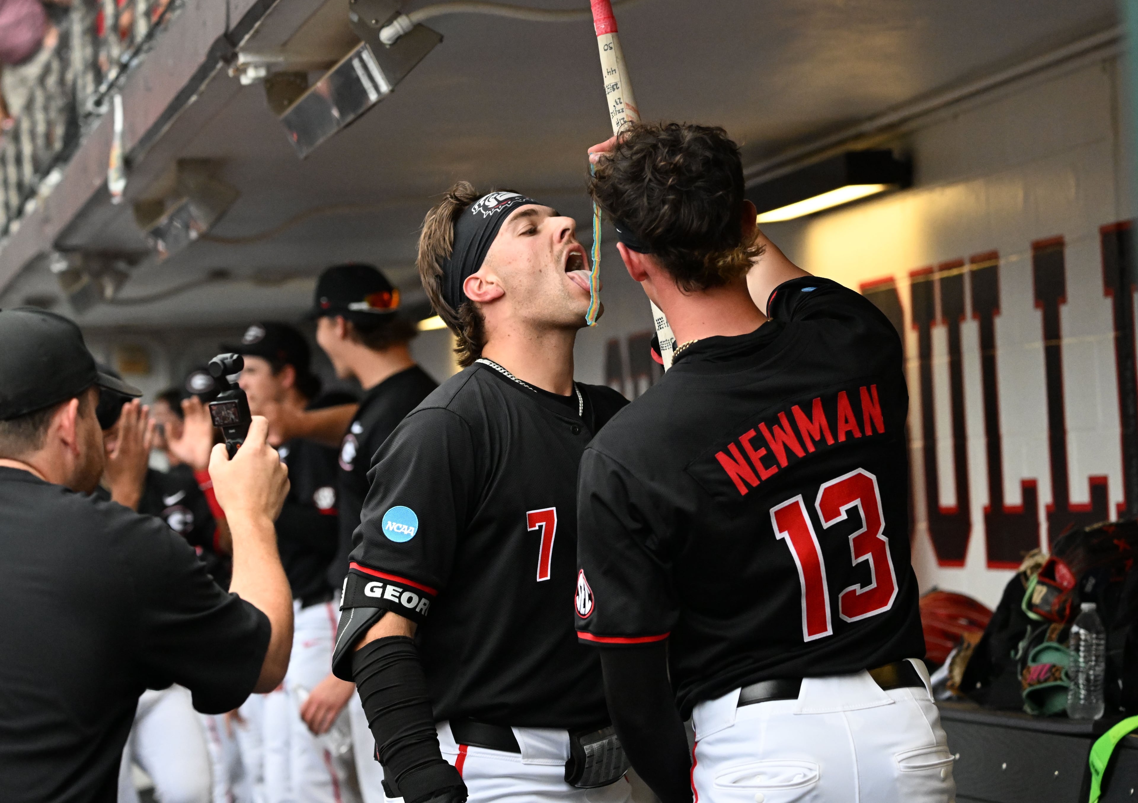 Georgia catcher Jack Arcamone (7) celebrates with teammates after hitting a 2-run home run during the third inning of their NCAA Regional game at Foley Field, Friday, May 29, 2026, in Athens. (Hyosub Shin/AJC)