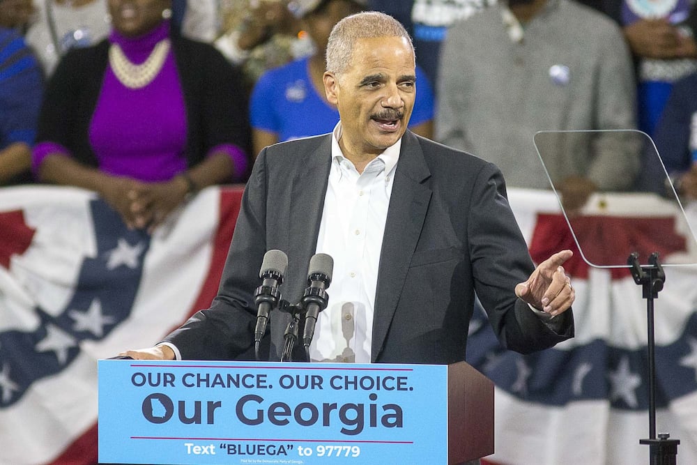 Former U.S. Attorney General Eric Holder speaks during a November 2018 rally for then Democratic nominee for governor Stacey Abrams inside Forbes Arena at Morehouse College. (Alyssa Pointer/AJC)