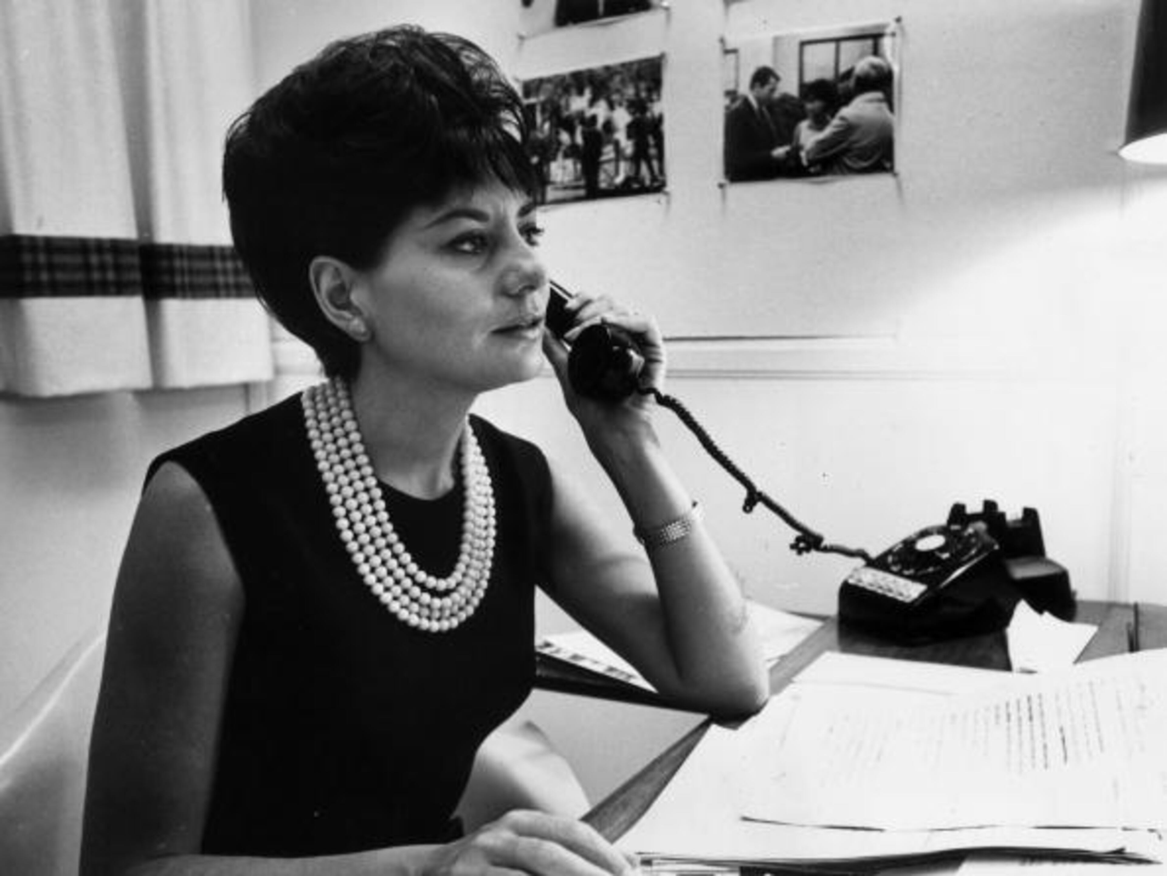 circa 1964: Television journalist for NBC Barbara Walters takes a phone call at her desk, New York City. (Photo by Hulton Archive/Getty Images)