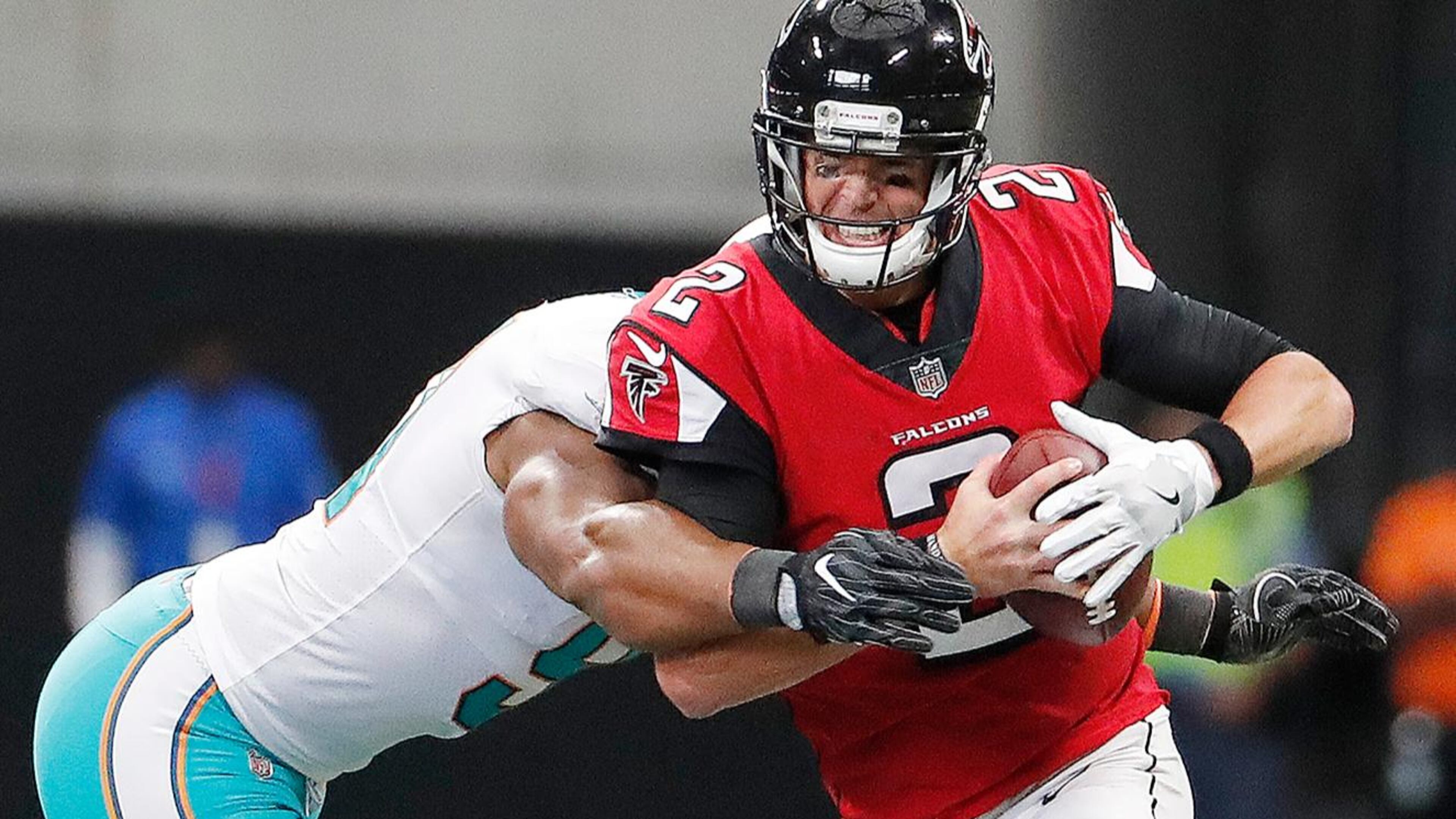 Miami Dolphins defensive end Cameron Wake (91) sacks Atlanta Falcons quarterback Matt Ryan (2) during the second half Sunday, Oct. 15, 2017, in Atlanta.