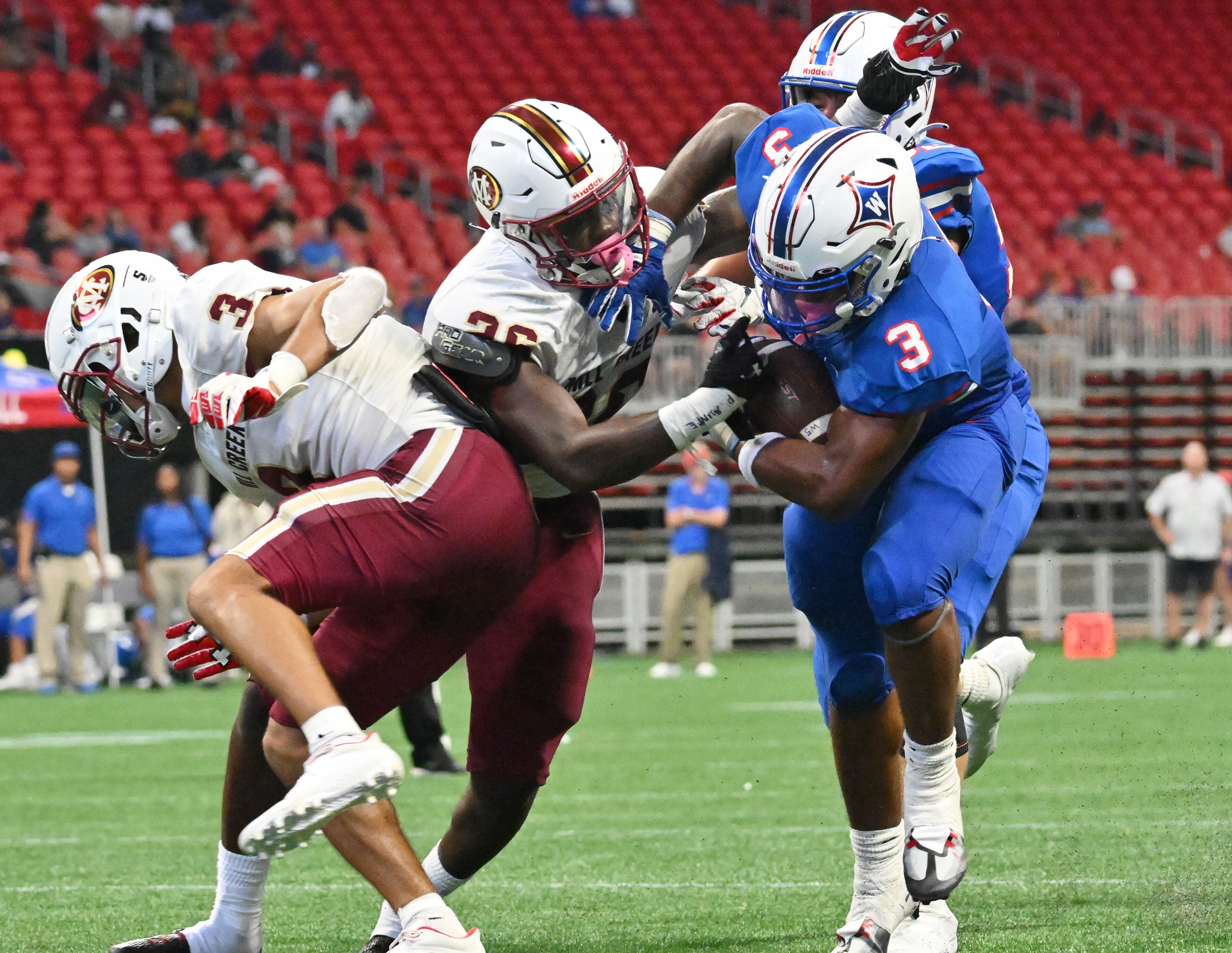 August 20 , 2022 Atlanta - Mill Creek's Trajen Greco (3) rushes for a touchdown during the 2022 Corky Kell Classic at Mercedes Benz Stadium on Saturday, August 20, 2022. Mill Creek won 44-41 over Walton. (Hyosub Shin / Hyosub.Shin@ajc.com)