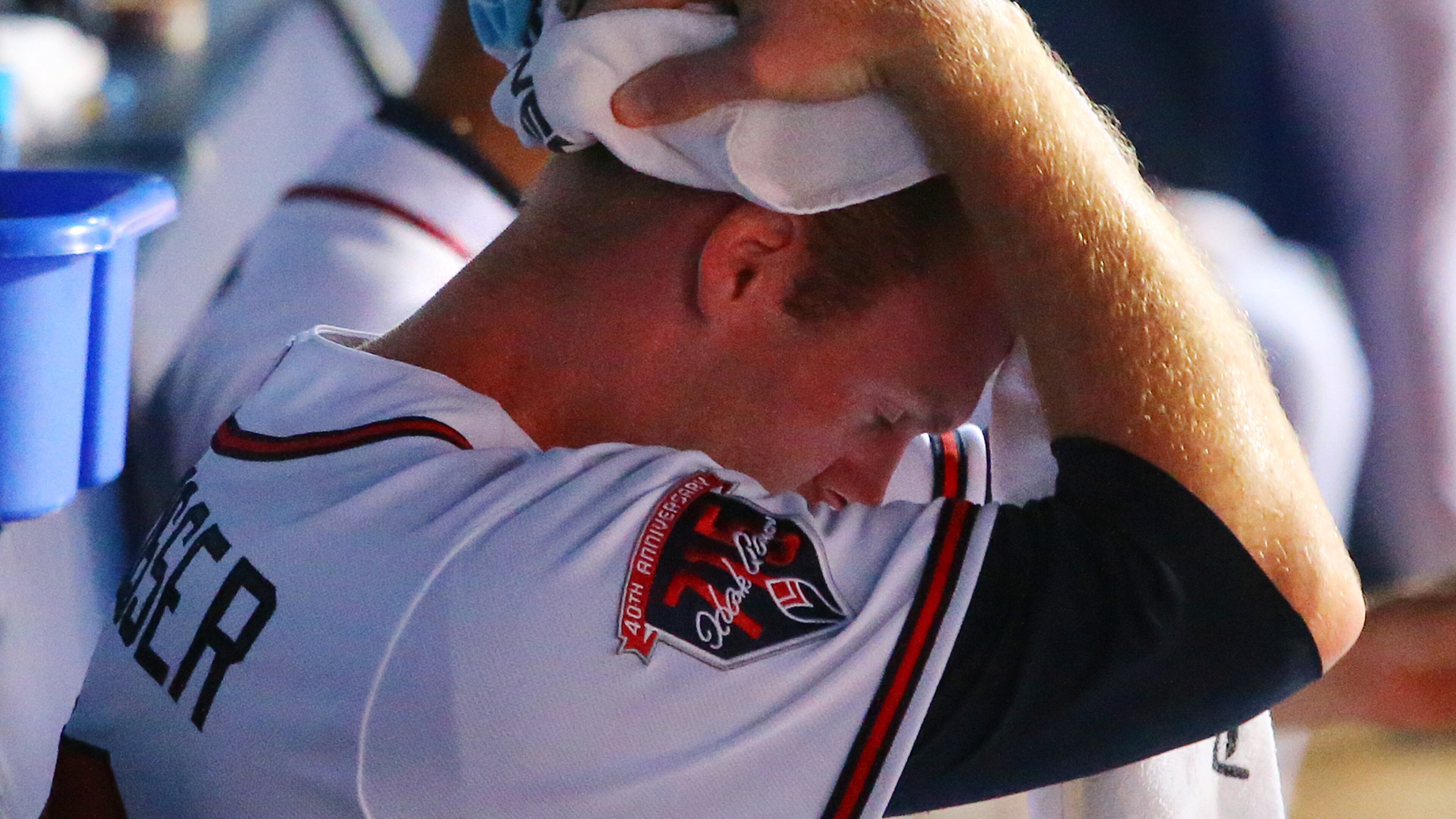 Braves pitcher Gus Schlosser reacts in the dugout after being pulled in late innings against the Pirates in a baseball game on Thursday, Sept. 25, 2014, in Atlanta. CURTIS COMPTON / CCOMPTON@AJC.COM