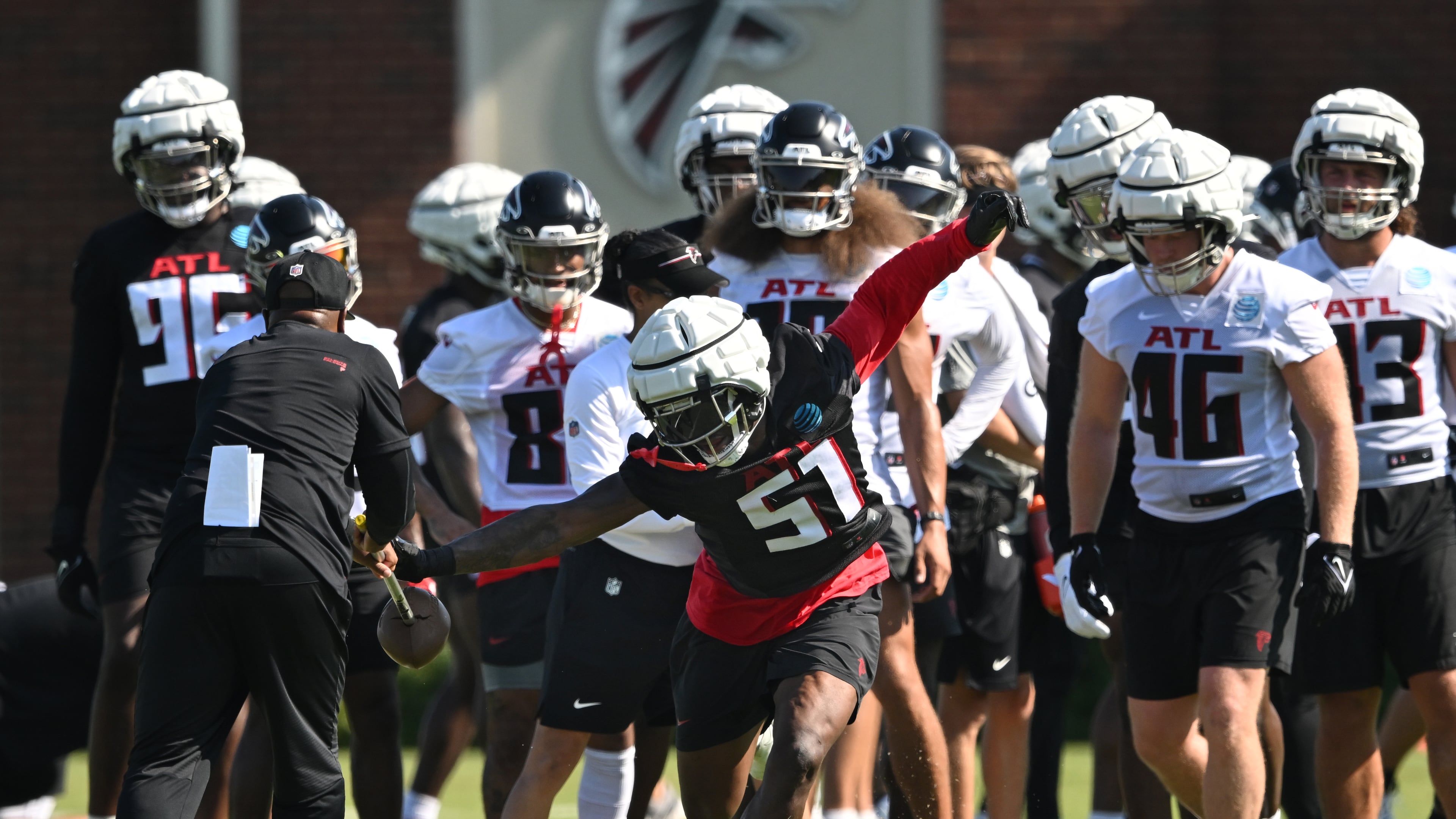 Atlanta Falcons' DeAngelo Malone (51) runs a drill during the first day of 2023 AT&T Atlanta Falcons Training Camp at Atlanta Falcons Corporate Headquarters and Training Facility, Wednesday, July 26, 2023, in Flowery Branch. (Hyosub Shin/AJC)
