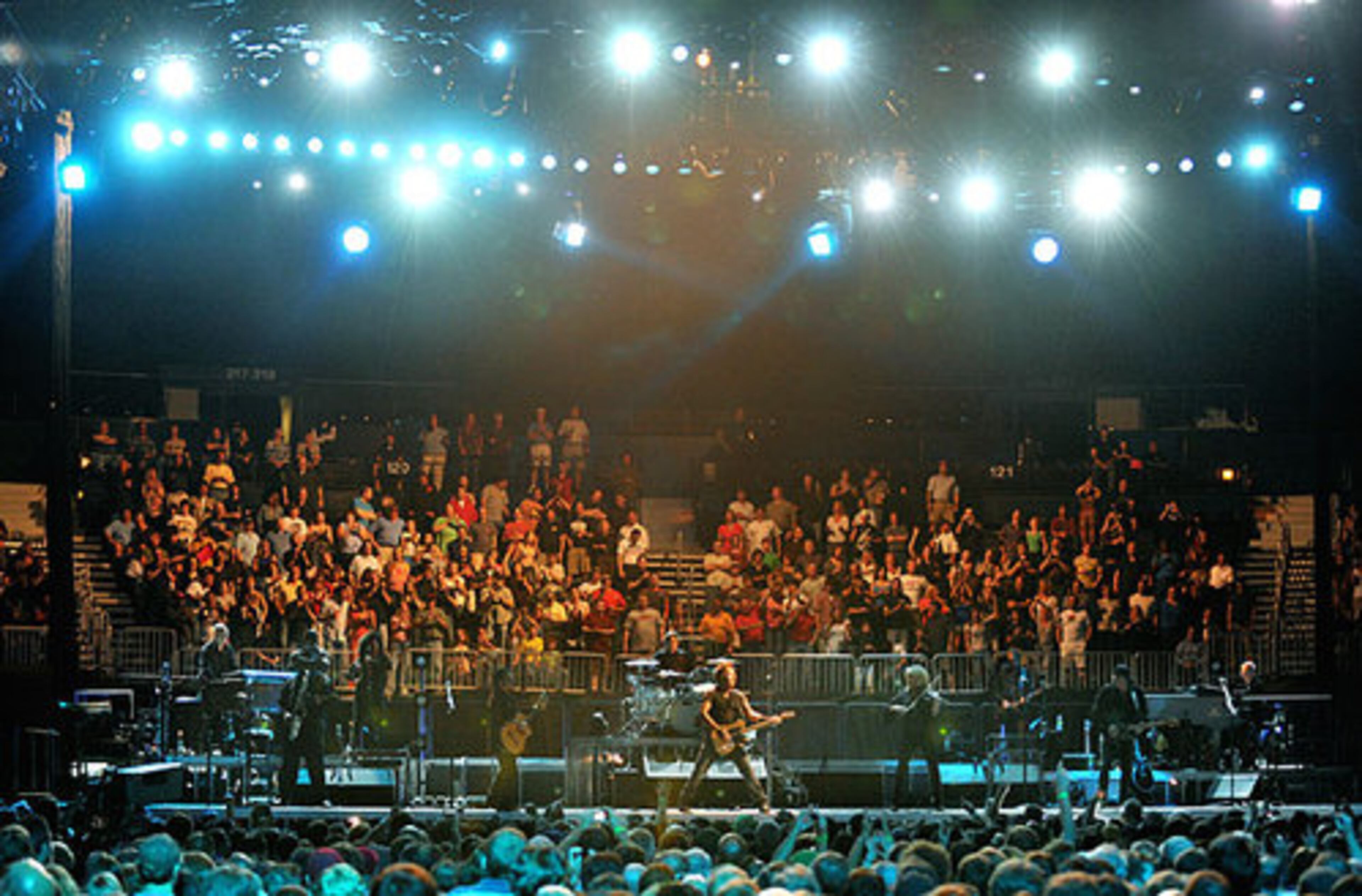 As the lights went up, several hundred people rocked from behind the stage, getting an up close view of the performance.