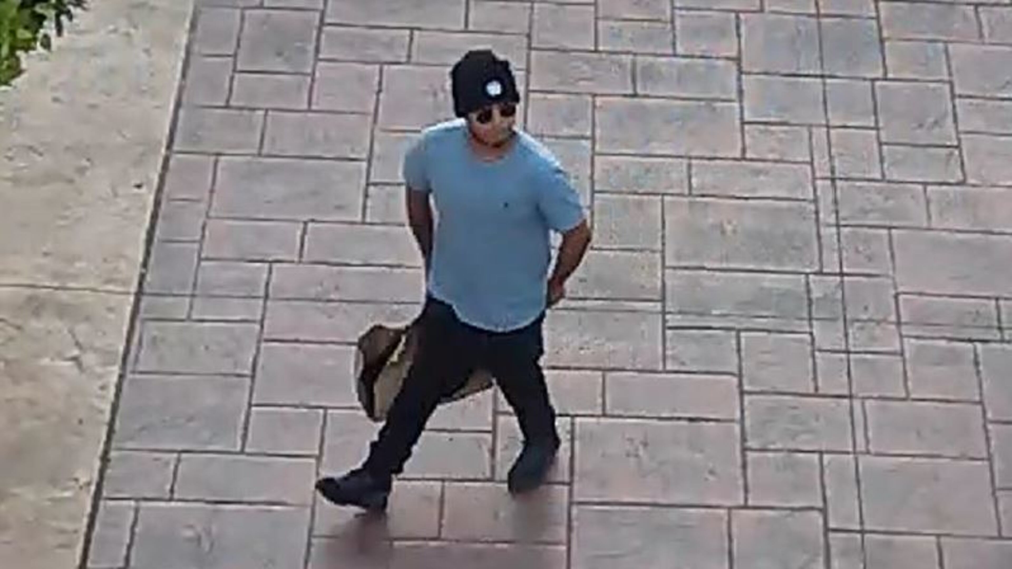 Police are searching for this man in connection with a report of shots fired outside the Outlet Shoppes at Atlanta in Woodstock. (Credit: Woodstock Police Department)