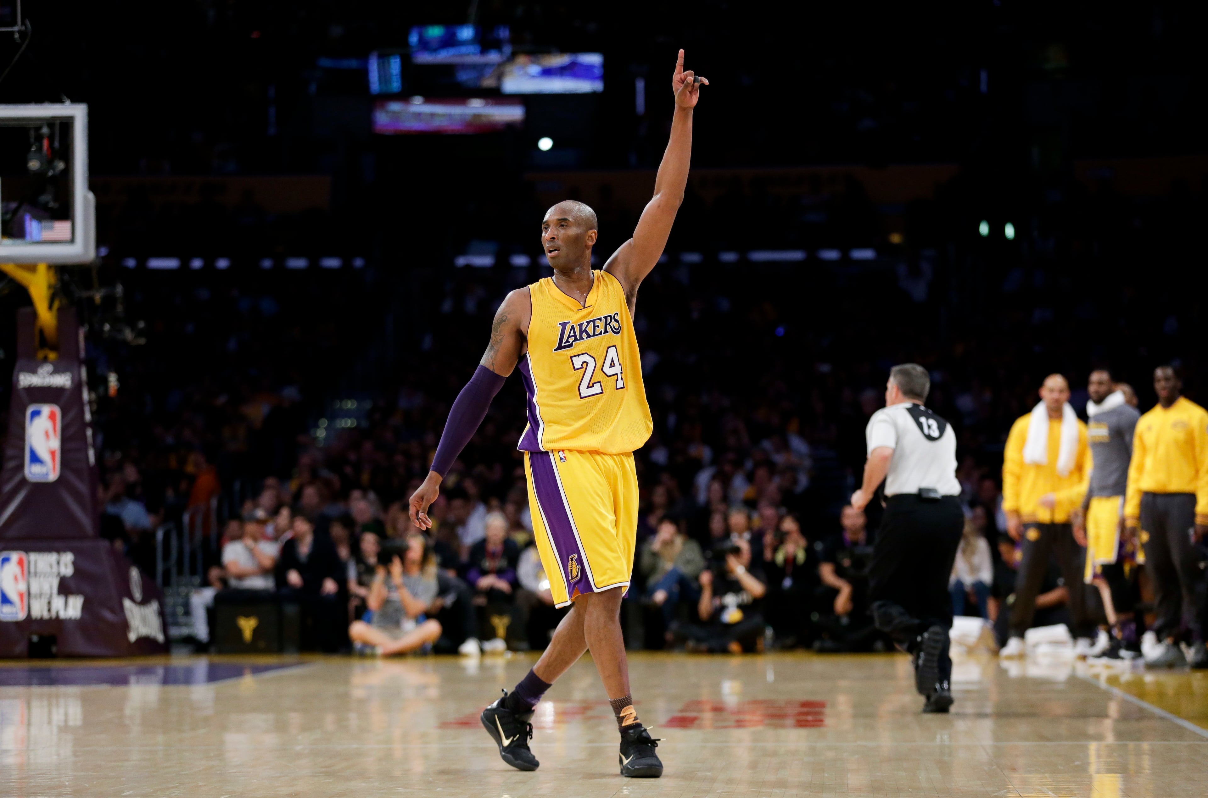 Los Angeles Lakers forward Kobe Bryant gestures during the first half of Bryant's last NBA basketball game, against the Utah Jazz, on Wednesday, April 13, 2016, in Los Angeles. (AP Photo/Jae C. Hong)