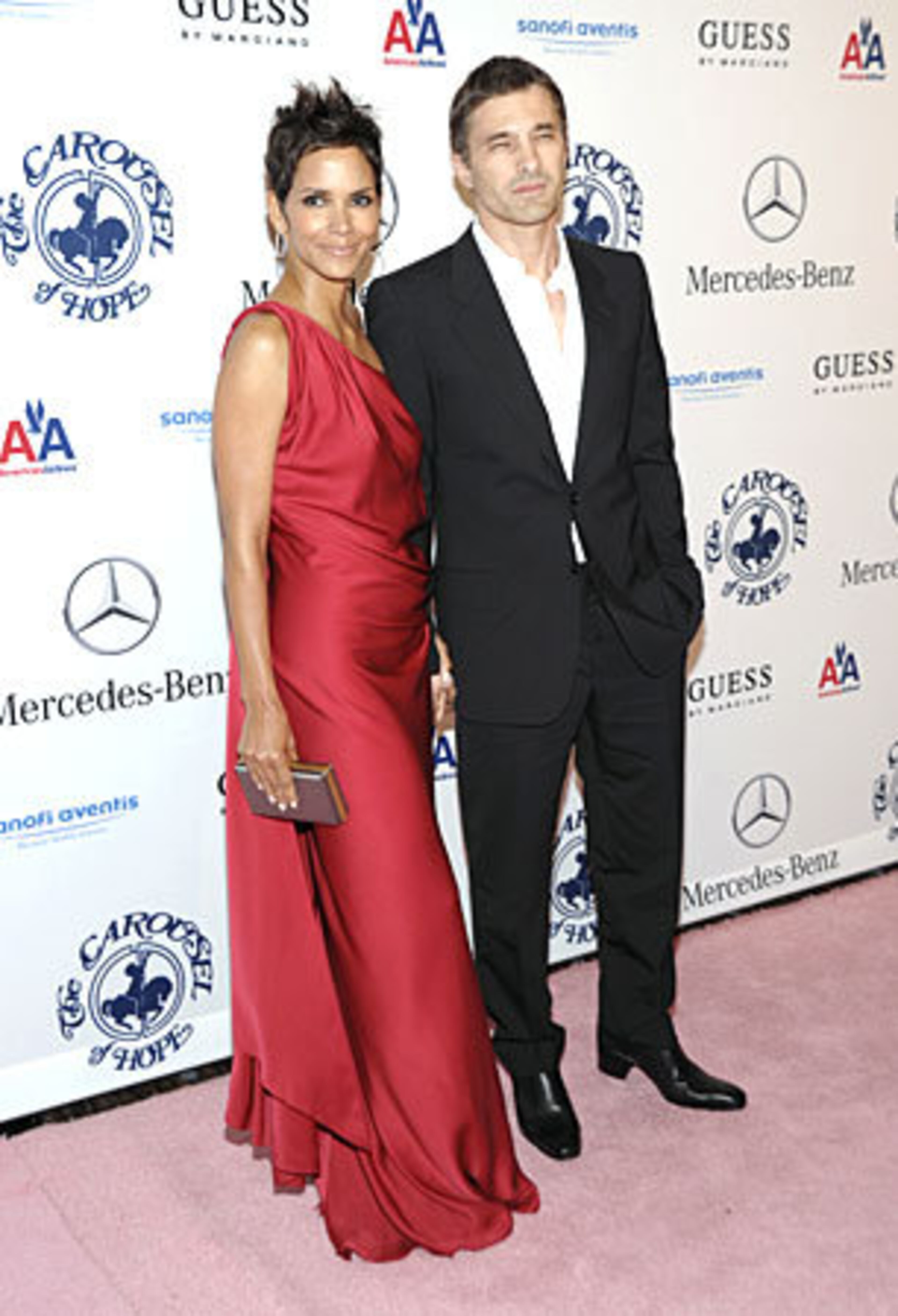 Actress Halle Berry, left, and actor Olivier Martinez arrive at the 32nd Annual Carousel of Hope Ball in Beverly Hills, Calif. on Saturday, Oct. 23, 2010.