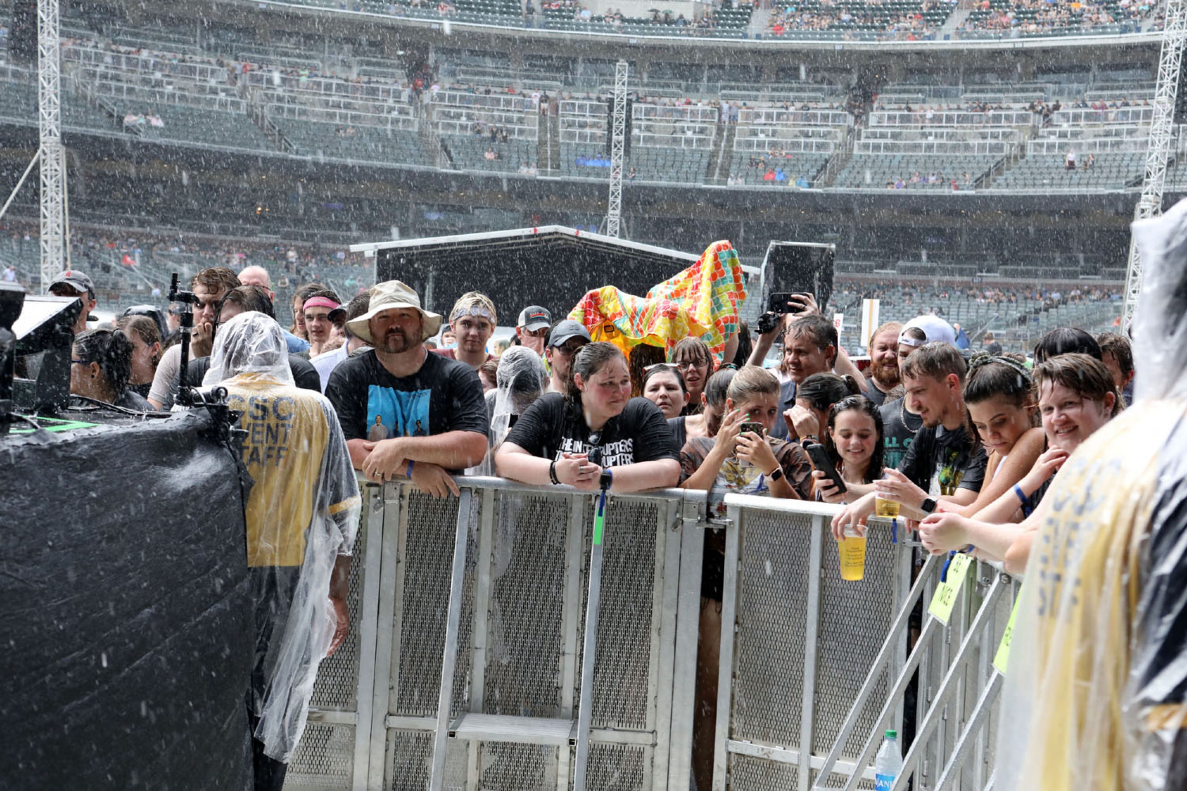 Rains early in the day could not deter the huge crown celebrating the return of live music
Green Day, Fall Out Boy and Weezer rocked out Truist Park on Tuesday, July 27, 2021 on the Hella Mega Tour.
An estimated 40,000 concert fans celebrated the return of live music and even early rains could not dampen the festive atmosphere at the Braves stadium.
Robb Cohen for the Atlanta Journal-Constitution