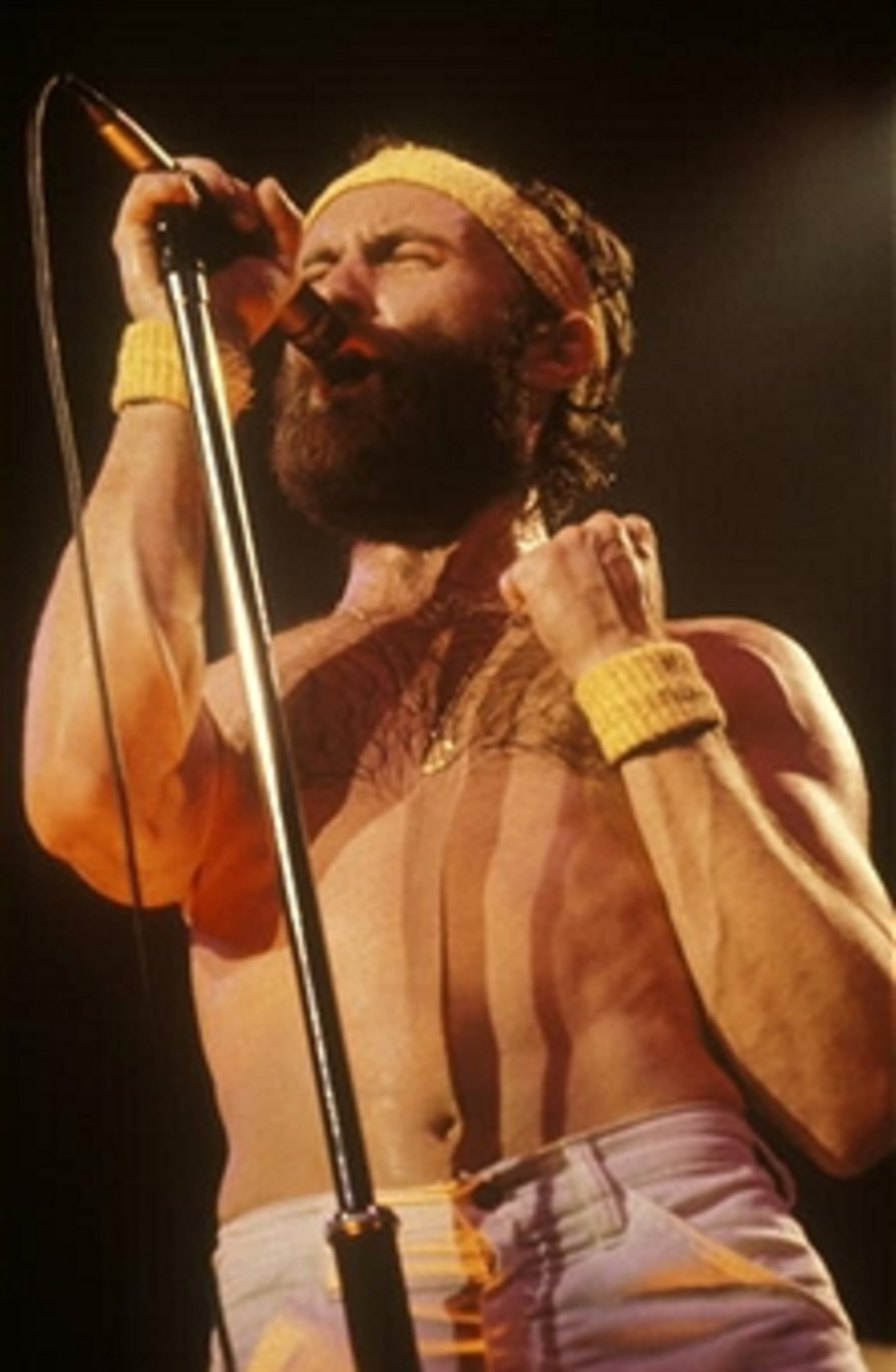 UNITED STATES - JUNE 01: Photo of Phil COLLINS and GENESIS; Phil Collins performing live onstage, beard, sweat bands (Photo by Charlyn Zlotnik/Redferns)