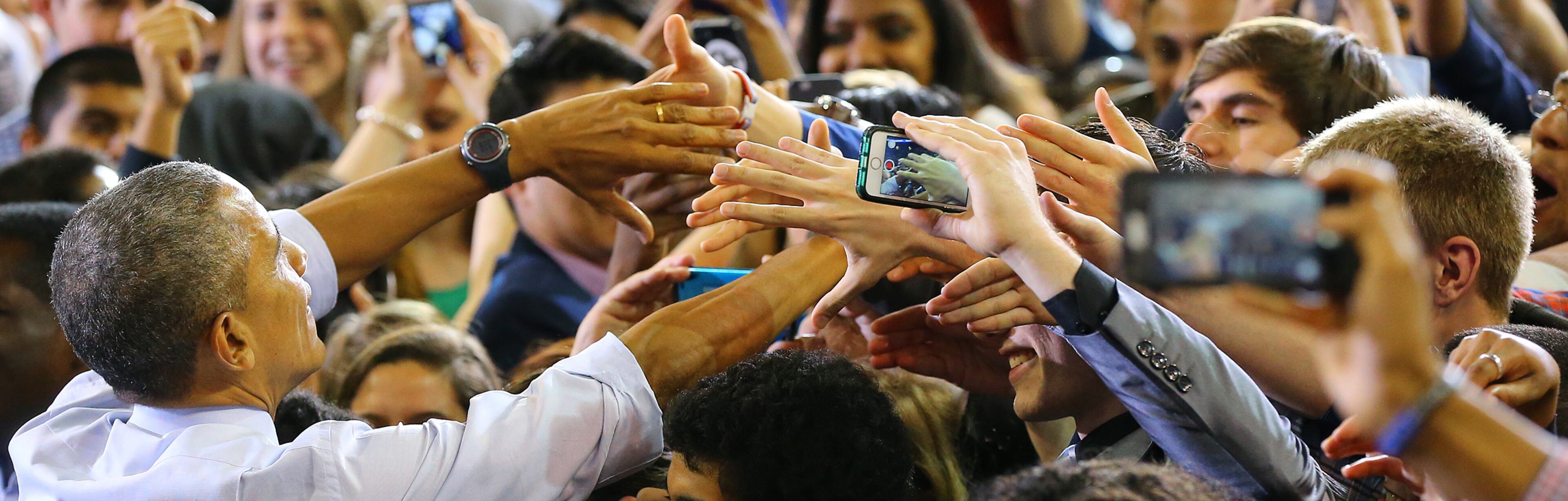 Students reach for a handshake from President Barack Obama as he works the crowd after his address at Georgia Tech on Tuesday, March 10, 2015, in Atlanta. Curtis Compton / ccompton@ajc.com